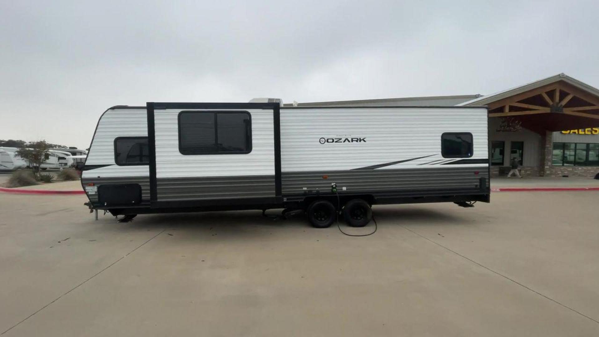 2020 FOREST RIVER OZARK 2700TH (4X4TZKC24LY) , Length:32.33 ft | Dry Weight: 5,683 lbs. | Gross Weight: 7,830 lbs. | Slides: 1 transmission, located at 4319 N Main Street, Cleburne, TX, 76033, (817) 221-0660, 32.435829, -97.384178 - Discover the ultimate in versatility with the 2020 Forest River Ozark 2700TH. This toy hauler travel trailer is expertly crafted to satisfy your adventurous side while providing unparalleled comfort. This model is designed to strike the perfect balance between spaciousness and maneuverability. With - Photo#6