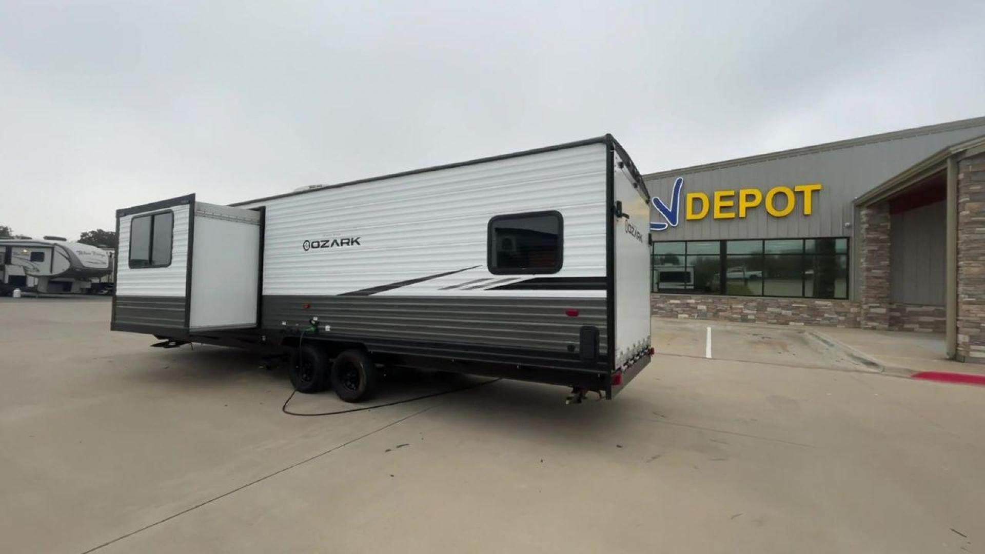 2020 FOREST RIVER OZARK 2700TH (4X4TZKC24LY) , Length:32.33 ft | Dry Weight: 5,683 lbs. | Gross Weight: 7,830 lbs. | Slides: 1 transmission, located at 4319 N Main Street, Cleburne, TX, 76033, (817) 221-0660, 32.435829, -97.384178 - Discover the ultimate in versatility with the 2020 Forest River Ozark 2700TH. This toy hauler travel trailer is expertly crafted to satisfy your adventurous side while providing unparalleled comfort. This model is designed to strike the perfect balance between spaciousness and maneuverability. With - Photo#7