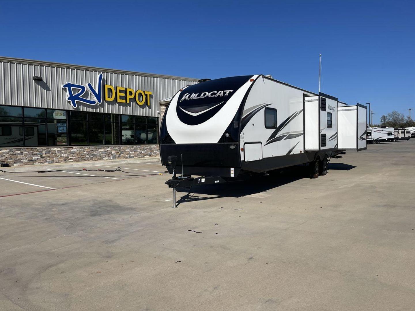 2020 FOREST RIVER WILDCAT 343BIK (5ZT2WCZB7LB) , Length: 37.42 ft. | Dry Weight: 8,226 lbs. | Slides: 3 transmission, located at 4319 N Main Street, Cleburne, TX, 76033, (817) 221-0660, 32.435829, -97.384178 - Camping is made not only more comfortable but also more fun in this 2020 Forest River Wildcat 343BIK! With its front queen bed, rear bunkhouse, and convertible sofa and dinette, this trailer offers sleeping space for up to 9 people, making it a fantastic family trailer. This unit also boasts two - Photo#0