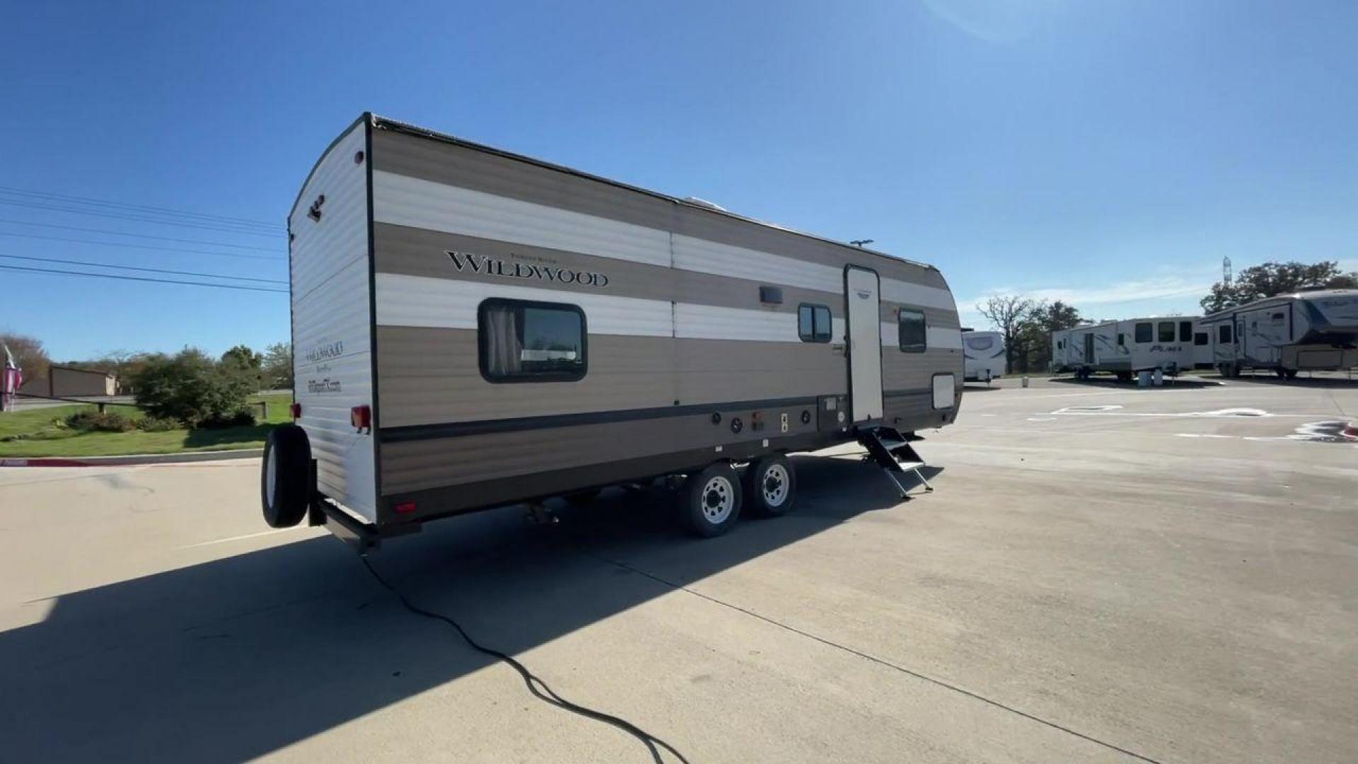 2020 WHITE FOREST RIVER WILDWOOD 26DBLE (4X4TWDB28LA) , Length: 30.4 ft. | Dry Weight: 5,868 lbs. | Gross Weight: 7775 lbs. | Slides: 1 transmission, located at 4319 N Main Street, Cleburne, TX, 76033, (817) 221-0660, 32.435829, -97.384178 - With the 2020 Forest River Wildwood 26DBLE, you can go on the best camping trip ever. This camping trailer is very flexible and has a lot of room to make your time outside more enjoyable. With a length of 30.4 feet and a weight of 5,868 pounds when empty, this RV is the perfect size for getting arou - Photo#1