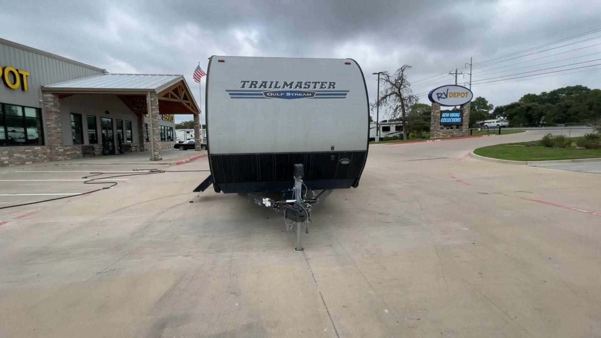 2020 WHITE GULFSTREAM TRAILMASTER 301TB (1NL1G3425L1) , Length: 34.08 ft. | Dry Weight: 6,845 lbs. | Slides: 1 transmission, located at 4319 N Main Street, Cleburne, TX, 76033, (817) 221-0660, 32.435829, -97.384178 - This 2020 Gulf Stream Trailmaster 301TB travel trailer measures 34.01 feet. There are two axles with steel wheels and electric drum brakes. Its dry weight is 6,845 lbs, its payload is 2,840 lbs, and its hitch is 885 lbs. The aluminum walls are painted gray with white and dark gray graphics. The 13,5 - Photo#4