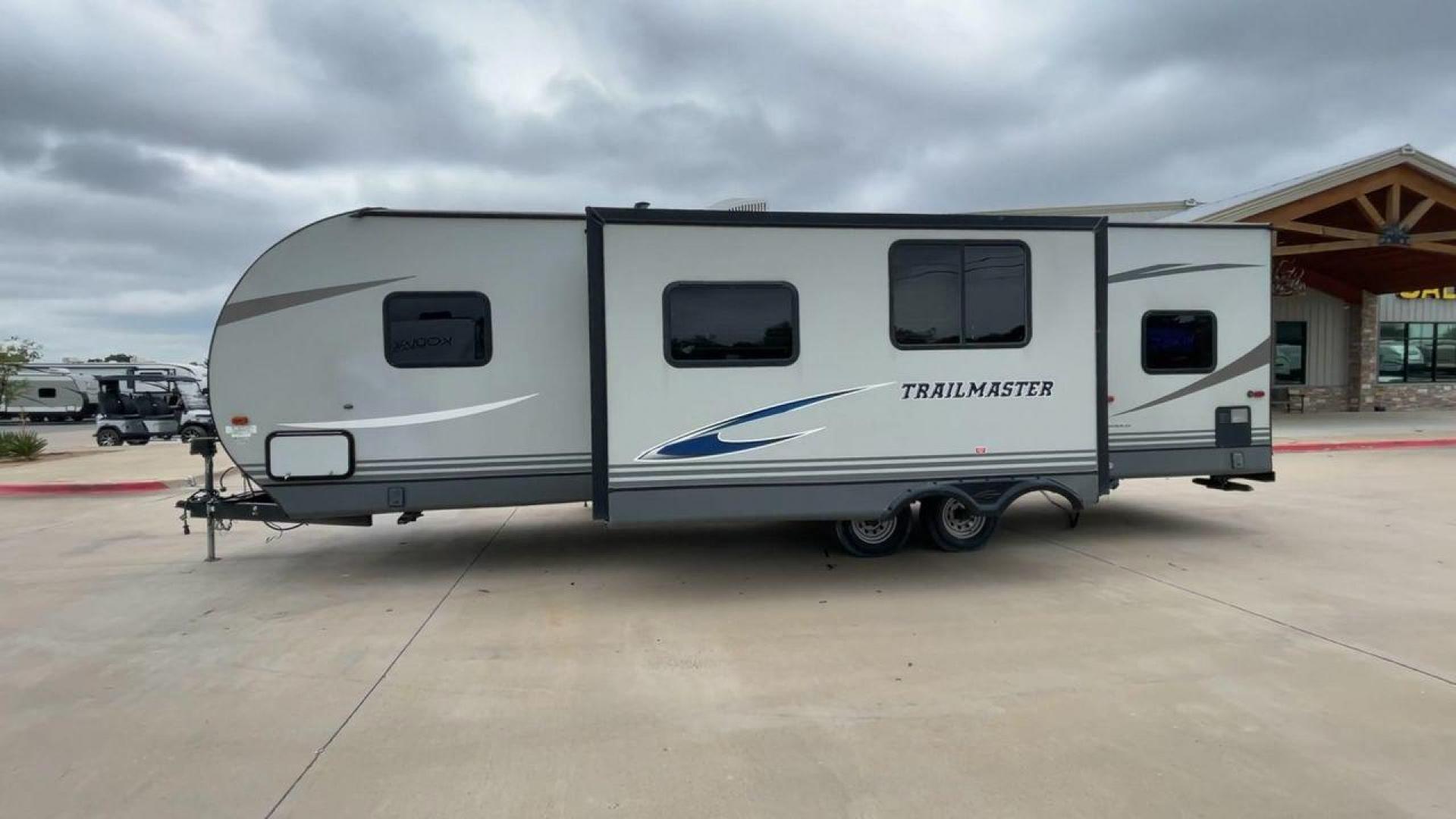 2020 WHITE GULFSTREAM TRAILMASTER 301TB (1NL1G3425L1) , Length: 34.08 ft. | Dry Weight: 6,845 lbs. | Slides: 1 transmission, located at 4319 N Main Street, Cleburne, TX, 76033, (817) 221-0660, 32.435829, -97.384178 - This 2020 Gulf Stream Trailmaster 301TB travel trailer measures 34.01 feet. There are two axles with steel wheels and electric drum brakes. Its dry weight is 6,845 lbs, its payload is 2,840 lbs, and its hitch is 885 lbs. The aluminum walls are painted gray with white and dark gray graphics. The 13,5 - Photo#6