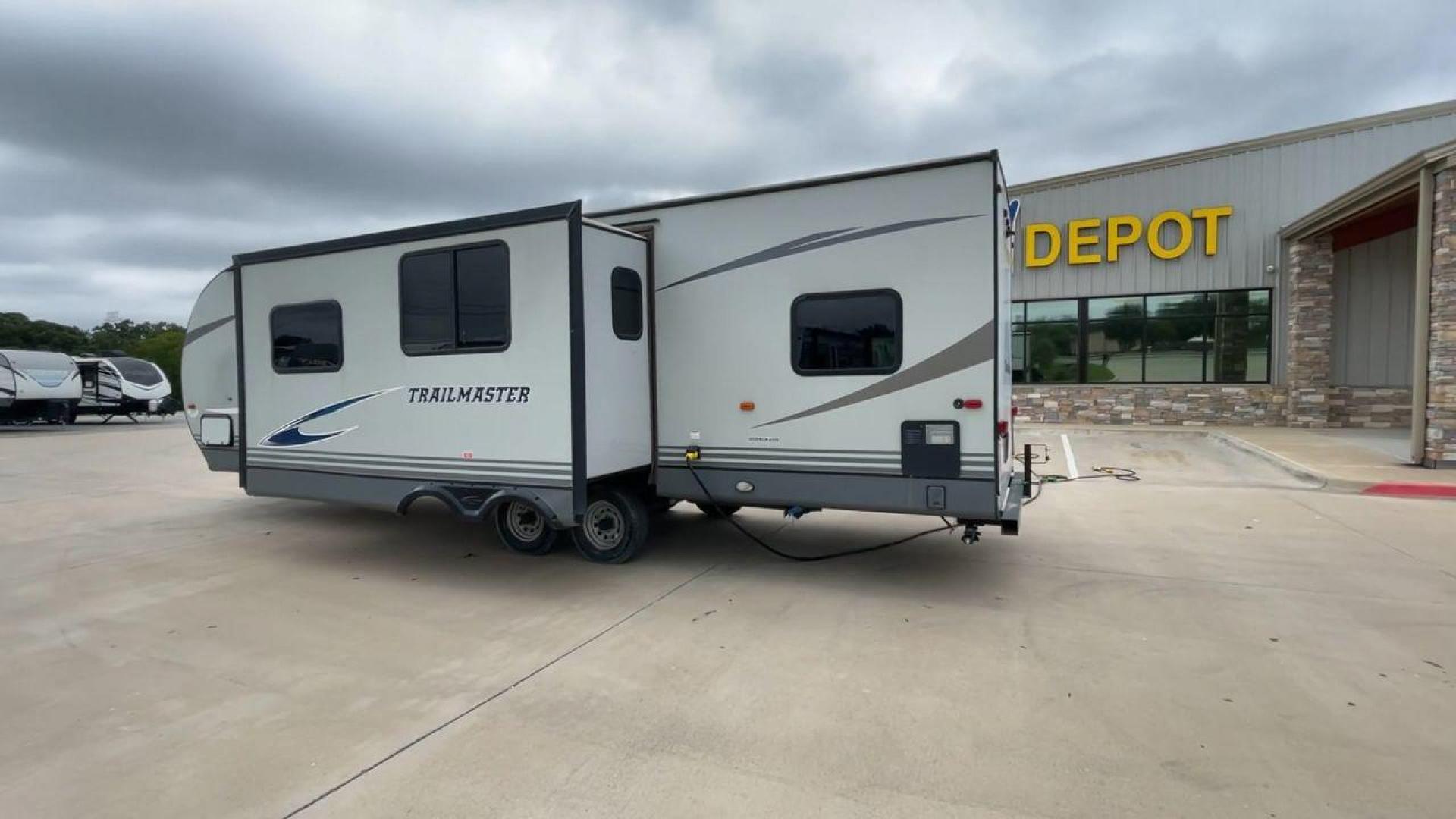 2020 WHITE GULFSTREAM TRAILMASTER 301TB (1NL1G3425L1) , Length: 34.08 ft. | Dry Weight: 6,845 lbs. | Slides: 1 transmission, located at 4319 N Main Street, Cleburne, TX, 76033, (817) 221-0660, 32.435829, -97.384178 - This 2020 Gulf Stream Trailmaster 301TB travel trailer measures 34.01 feet. There are two axles with steel wheels and electric drum brakes. Its dry weight is 6,845 lbs, its payload is 2,840 lbs, and its hitch is 885 lbs. The aluminum walls are painted gray with white and dark gray graphics. The 13,5 - Photo#7