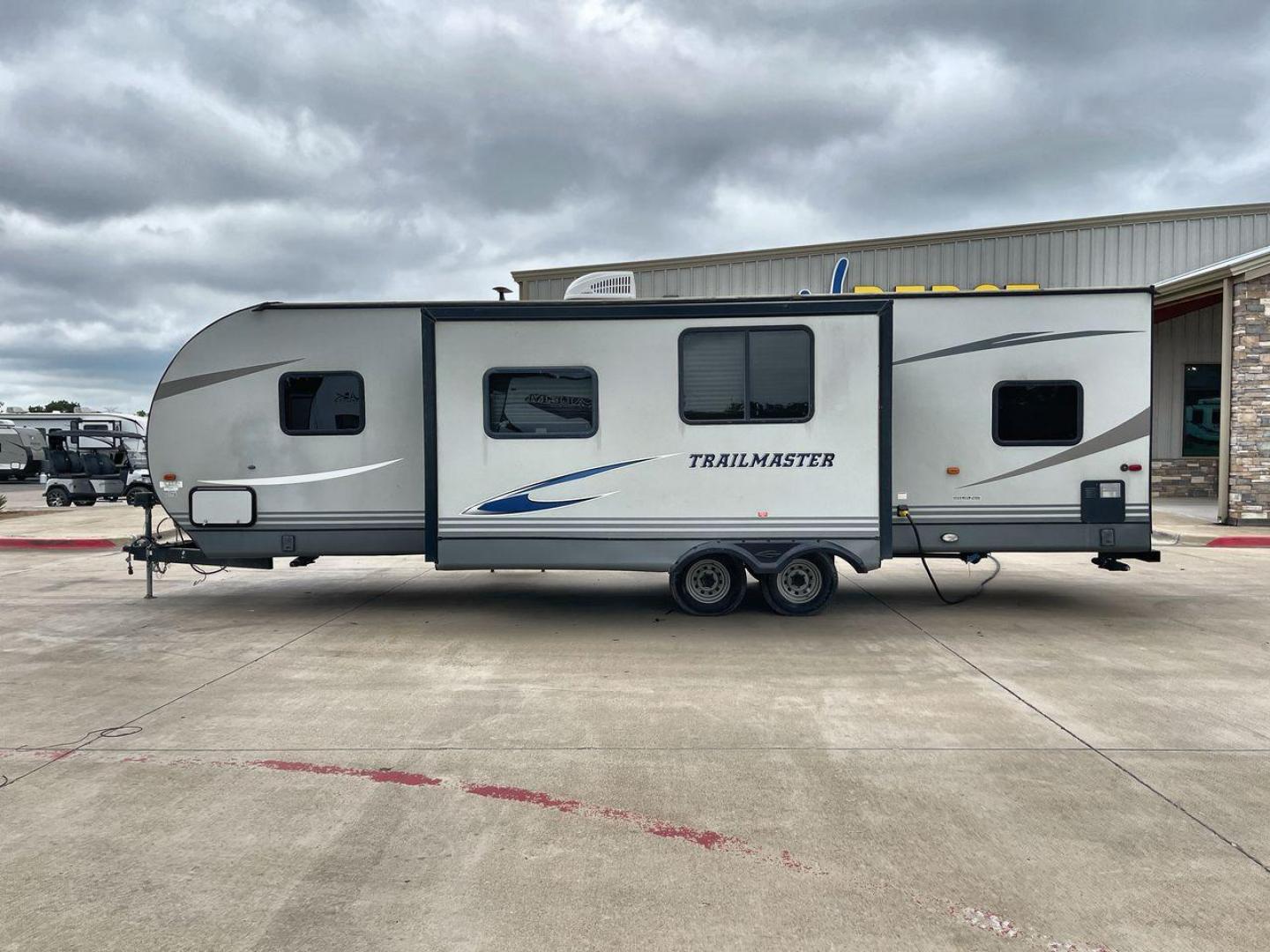 2020 WHITE GULFSTREAM TRAILMASTER 301TB (1NL1G3425L1) , Length: 34.08 ft. | Dry Weight: 6,845 lbs. | Slides: 1 transmission, located at 4319 N Main Street, Cleburne, TX, 76033, (817) 221-0660, 32.435829, -97.384178 - This 2020 Gulf Stream Trailmaster 301TB travel trailer measures 34.01 feet. There are two axles with steel wheels and electric drum brakes. Its dry weight is 6,845 lbs, its payload is 2,840 lbs, and its hitch is 885 lbs. The aluminum walls are painted gray with white and dark gray graphics. The 13,5 - Photo#24