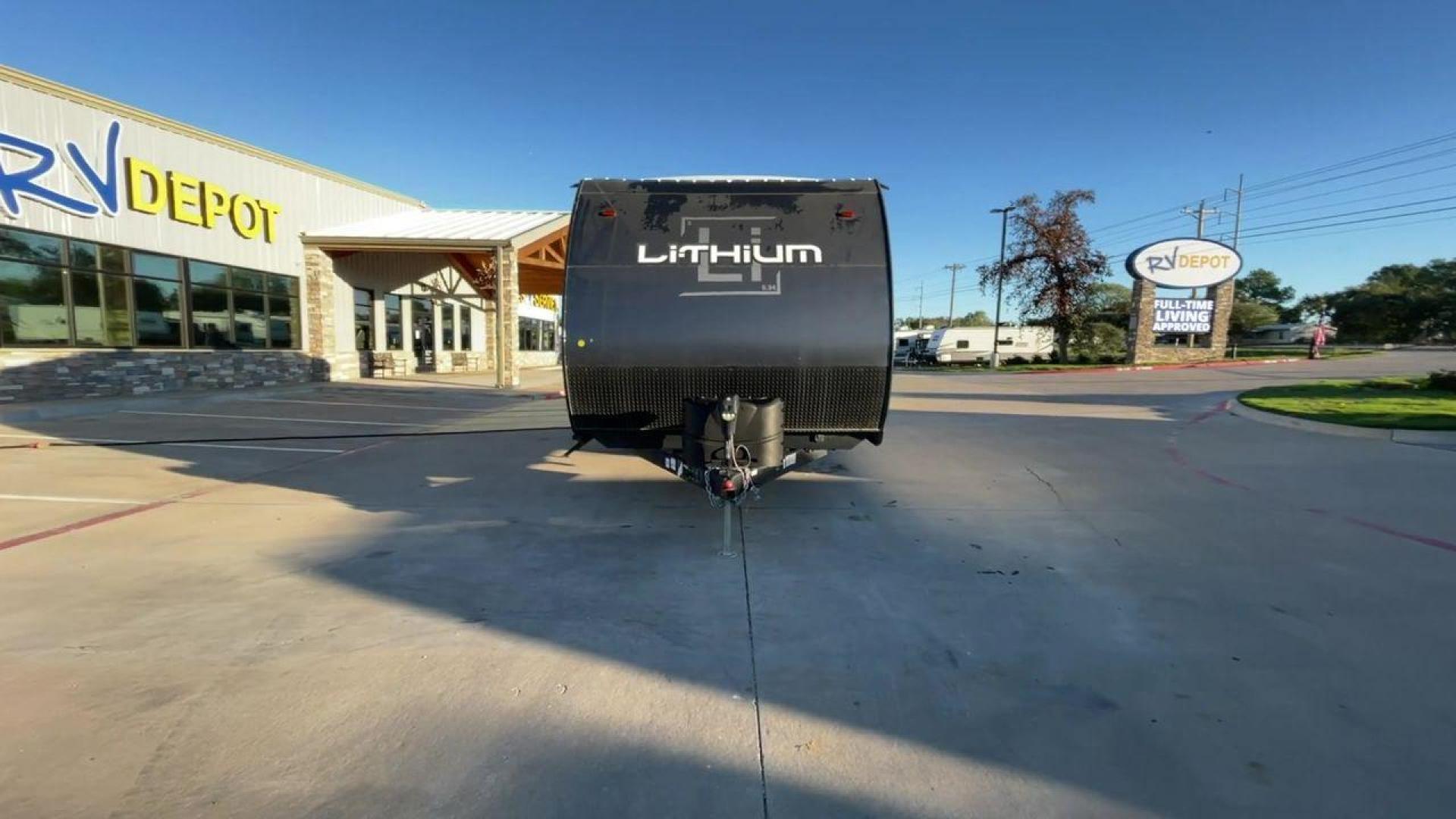 2020 HEARTLAND LITHIUM 2414 (5SFCB2928LE) , Length: 28.83 ft. | Dry Weight: 6,360 lbs. | Gross Weight: 10,600 lbs. | Slides: 0 transmission, located at 4319 N Main Street, Cleburne, TX, 76033, (817) 221-0660, 32.435829, -97.384178 - The 2020 Heartland Lithium 2414 is a versatile and well-designed toy hauler that combines functionality with modern comforts for your on-the-go lifestyle. With a length of almost 29 feet, this model, although not having a slide-out, can still provide you with an efficiently spacious interior. The Li - Photo#4