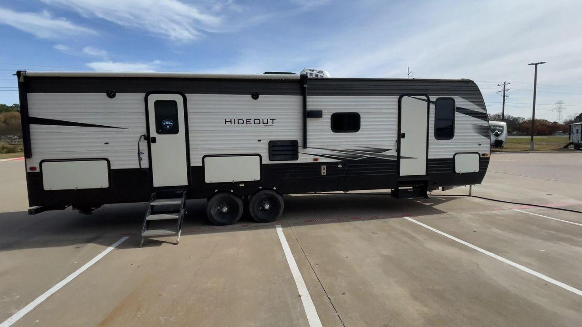 2020 KEYSTONE HIDEOUT 29DFS (4YDT29D26L7) , Length: 33.92 ft. | Dry Weight: 7,162 lbs. | Gross Weight: 9,680 lbs. | Slides: 1 transmission, located at 4319 N Main Street, Cleburne, TX, 76033, (817) 221-0660, 32.435829, -97.384178 - Take the whole family and a few extra on an adventure in this 2020 Keystone Hideout 29DFS! This travel trailer measures almost 34 feet long and 11 feet tall. It has a dry weight of 7,162 lbs. and a GVWR of 9,680 lbs. It includes one power slide as well as one power awning. This Hideout is a bu - Photo#2