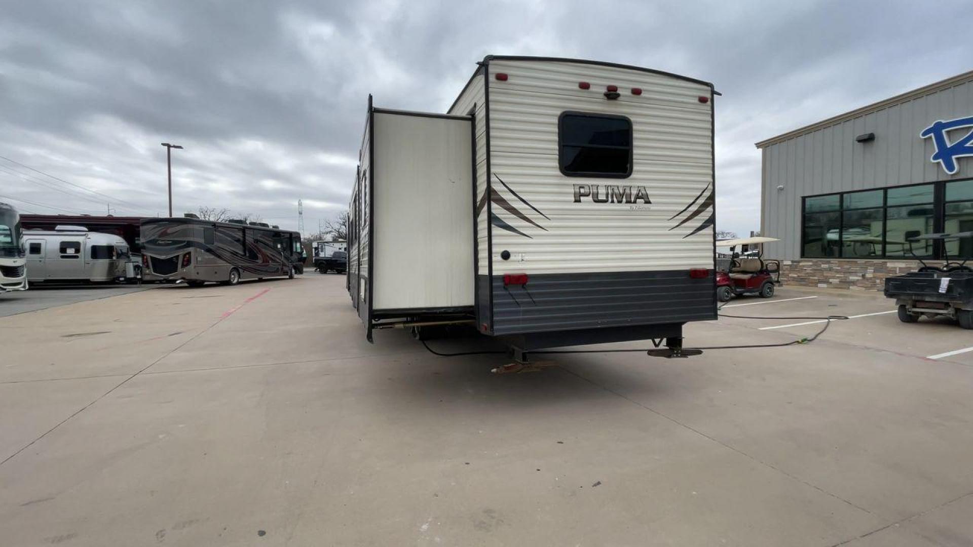 2020 NV DIGIL PUMA 38DBS - (4X4TPUP27LP) , Length: 41.92 ft | Dry Weight: 9,748 lbs. | Gross Weight: 11,522 lbs. | Slides: 3. transmission, located at 4319 N Main Street, Cleburne, TX, 76033, (817) 221-0660, 32.435829, -97.384178 - With its impressive features and unbeatable price of $38,995, this RV is sure to make your road trip dreams come true. The 2020 Puma 38DBS is a spacious and stylish travel trailer designed for both comfort and functionality. Its exterior features a striking combination of cream and gray tones with s - Photo#8