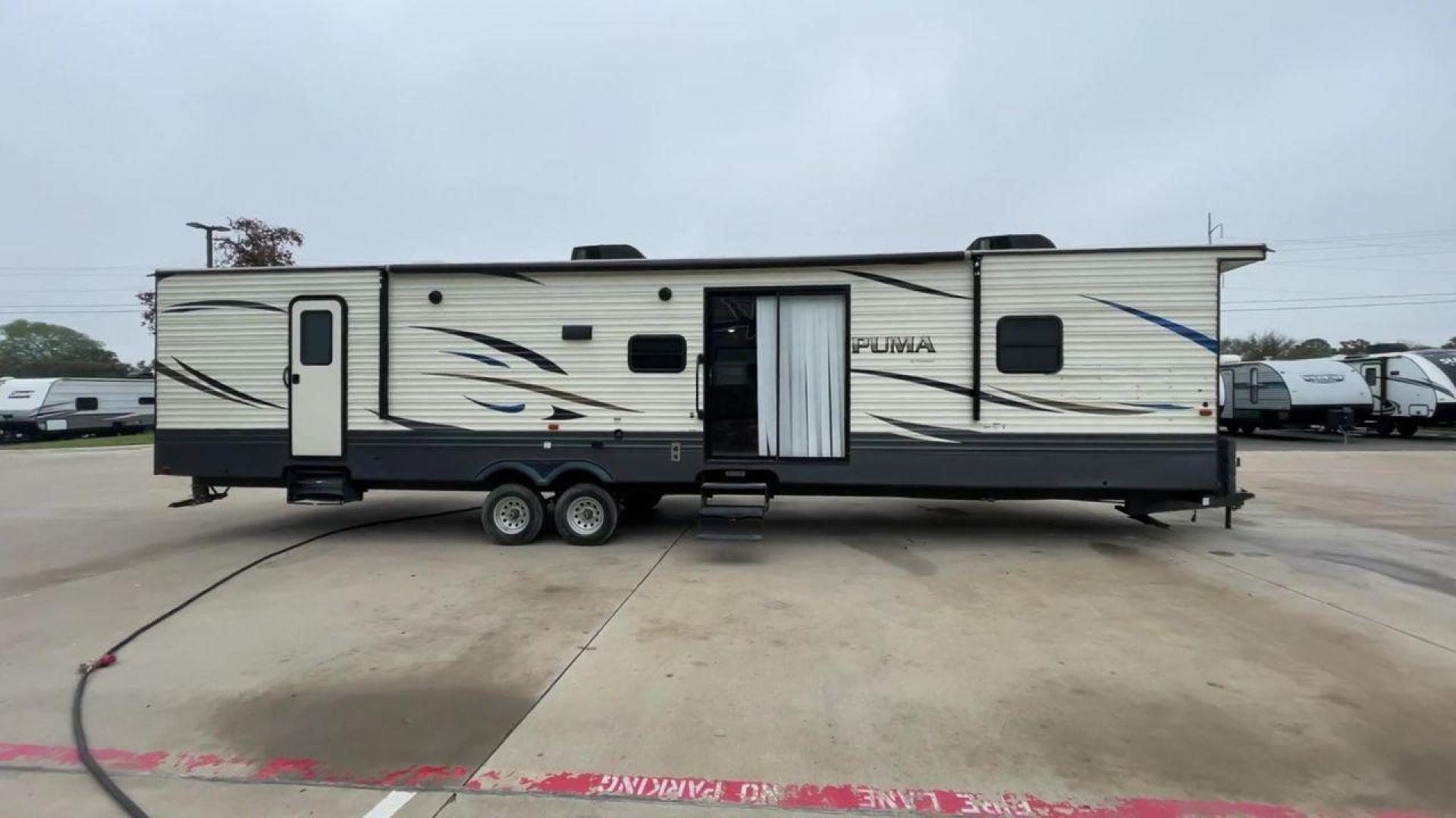 2020 NV DIGIL PUMA 38DBS - (4X4TPUP27LP) , Length: 41.92 ft | Dry Weight: 9,748 lbs. | Gross Weight: 11,522 lbs. | Slides: 3. transmission, located at 4319 N Main Street, Cleburne, TX, 76033, (817) 221-0660, 32.435829, -97.384178 - If you're in the market for a spacious and luxurious travel trailer bunk house, look no further than this 2020 PUMA 38DBS available at RV Depot in Cleburne, TX. With its impressive features and unbeatable price of $38,995, this RV is sure to make your road trip dreams come true. Located in the be - Photo#2