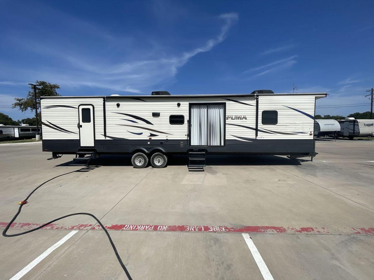 2020 NV DIGIL PUMA 38DBS - (4X4TPUP27LP) , Length: 41.92 ft | Dry Weight: 9,748 lbs. | Gross Weight: 11,522 lbs. | Slides: 3. transmission, located at 4319 N Main Street, Cleburne, TX, 76033, (817) 221-0660, 32.435829, -97.384178 - If you're in the market for a spacious and luxurious travel trailer bunk house, look no further than this 2020 PUMA 38DBS available at RV Depot in Cleburne, TX. With its impressive features and unbeatable price of $38,995, this RV is sure to make your road trip dreams come true. Located in the be - Photo#28