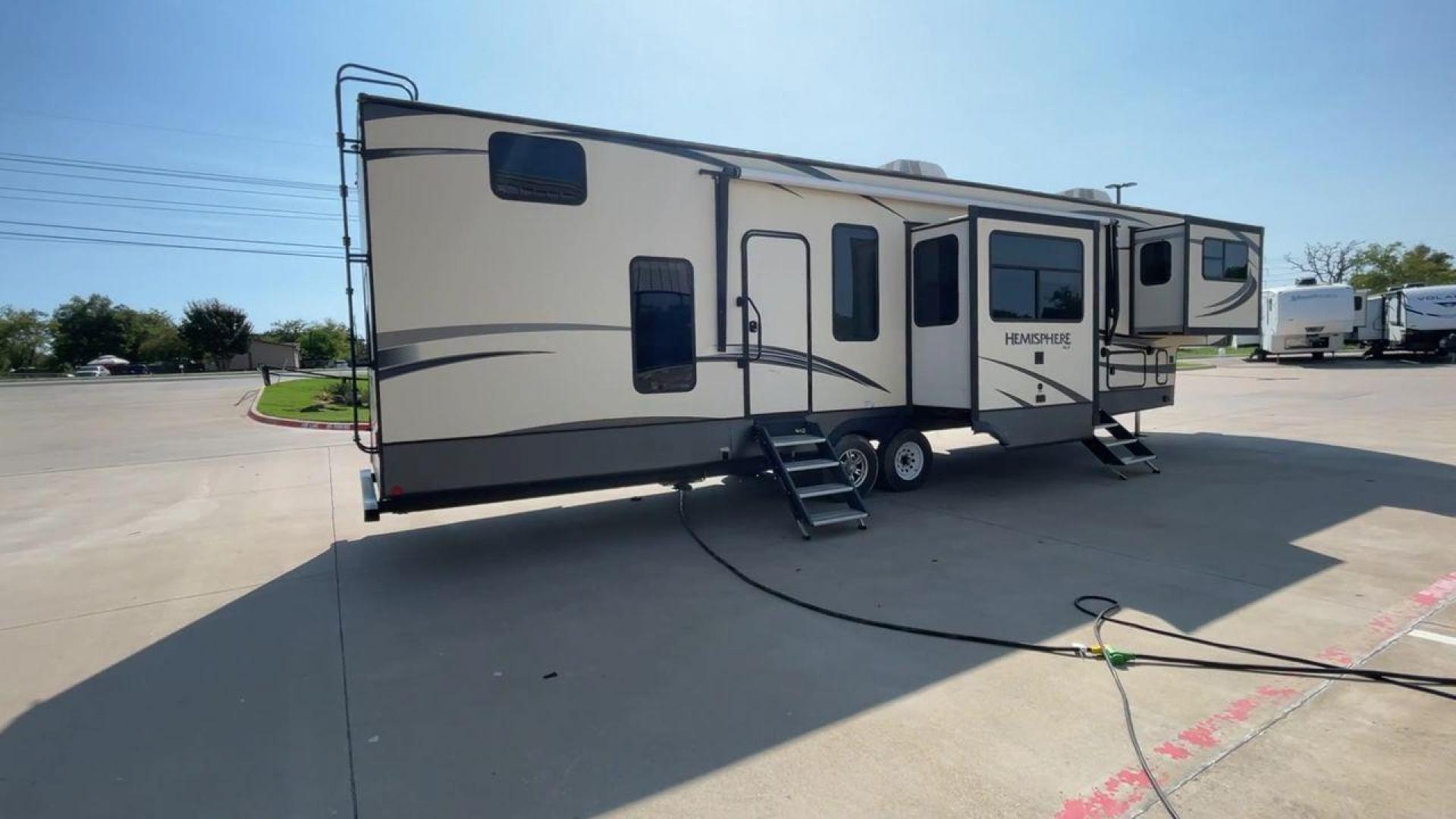 2020 WHITE SALEM HEMISPHERE GLX378FL - (4X4FSBP23LV) , Length: 43.42 ft. | Dry Weight: 11,589 lbs. | Slides: 5 transmission, located at 4319 N Main Street, Cleburne, TX, 76033, (817) 221-0660, 32.435829, -97.384178 - The 2020 Salem Hemisphere GLX378F is a luxurious fifth wheel that stands out with its expansive design and premium features. With an impressive length of 43 feet and five slides, this model ensures a spacious and inviting living space that redefines the concept of comfort on the road. The dual entry - Photo#1