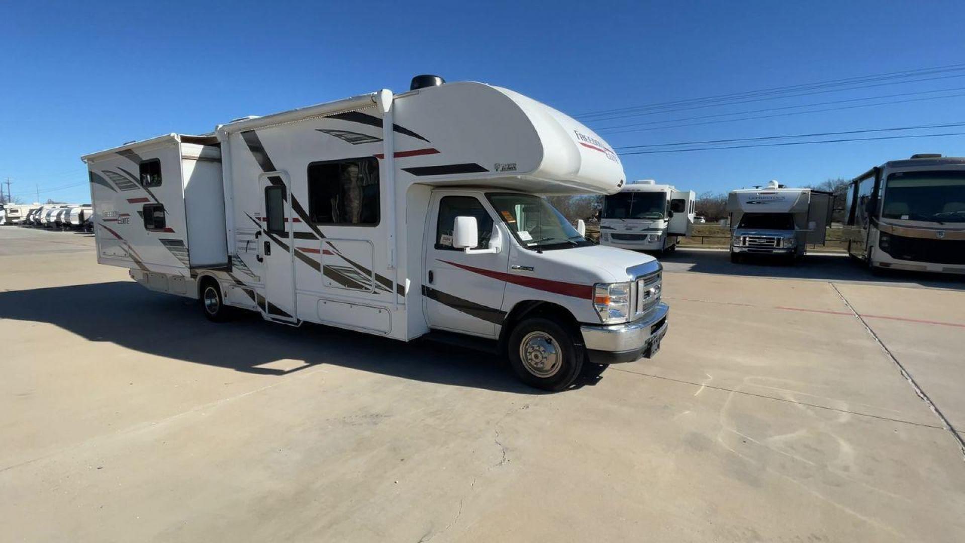 2020 THOR FREEDOM ELITE 30FE (1FDXE4FS9KD) , Length: 32.17 ft. | Gross Weight: 14,500 lbs. | Slides: 2 transmission, located at 4319 N Main Street, Cleburne, TX, 76033, (817) 221-0660, 32.435829, -97.384178 - The 2020 Thor Freedom Elite 30FE is a versatile and family-friendly Class C motorhome that blends functionality, comfort, and style. Its thoughtful floor plan and amenities make it a great option for road trips, weekend getaways, or extended vacations. The dimensions of this unit are 32.17 ft in len - Photo#3