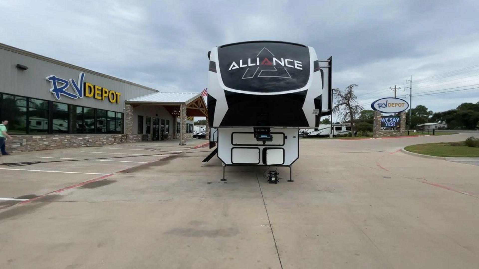 2021 ALLIANCE VALOR 42V13 (7M5FV4533MA) , Length: 44.08 ft. | Dry Weight: 16,064 lbs. | Gross Weight: 20,000 lbs. | Slides: 3 transmission, located at 4319 N Main Street, Cleburne, TX, 76033, (817) 221-0660, 32.435829, -97.384178 - The Valor 42V13 features a striking modern exterior with clean lines, highlighted by its sleek black, white, and gray color scheme. The multiple slide-outs (3) enhance interior space, while the large windows offer plenty of natural light. The rear garage entry has a ramp door for easy loading of rec - Photo#4