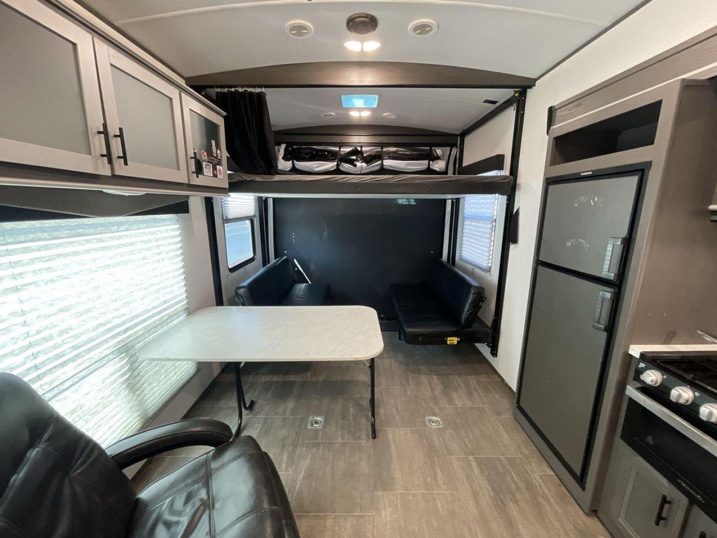 2021 CRUISER RV STRYKER 3414 (5RXGB392XM1) , Length: 38.75 ft. | Dry Weight: 9,608 lbs. | Gross Weight: 12,800 lbs. | Slides: 2 transmission, located at 4319 N Main Street, Cleburne, TX, 76033, (817) 221-0660, 32.435829, -97.384178 - The 2021 Cruiser RV Stryker 3414 is a meticulously crafted toy hauler that seamlessly integrates luxury, versatility, and durability to provide an exceptional on-the-road experience. Whether you're a passionate thrill-seeker indulging in outdoor sports or a discerning family seeking comfort, the Str - Photo#12