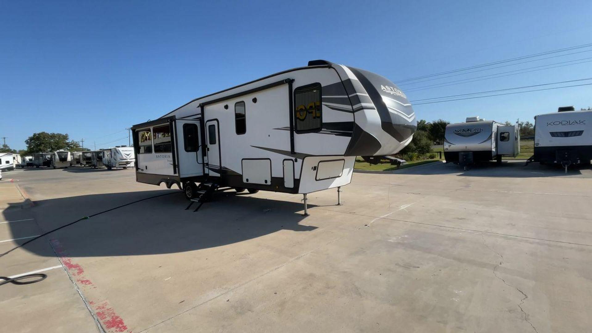 2021 DUTCHMEN ASTORIA 3173RLP (4YDF31727MM) , Length: 35.92 ft. | Dry Weight: 9,959 lbs. | Slides: 3 transmission, located at 4319 N Main Street, Cleburne, TX, 76033, (817) 221-0660, 32.435829, -97.384178 - Photo#3