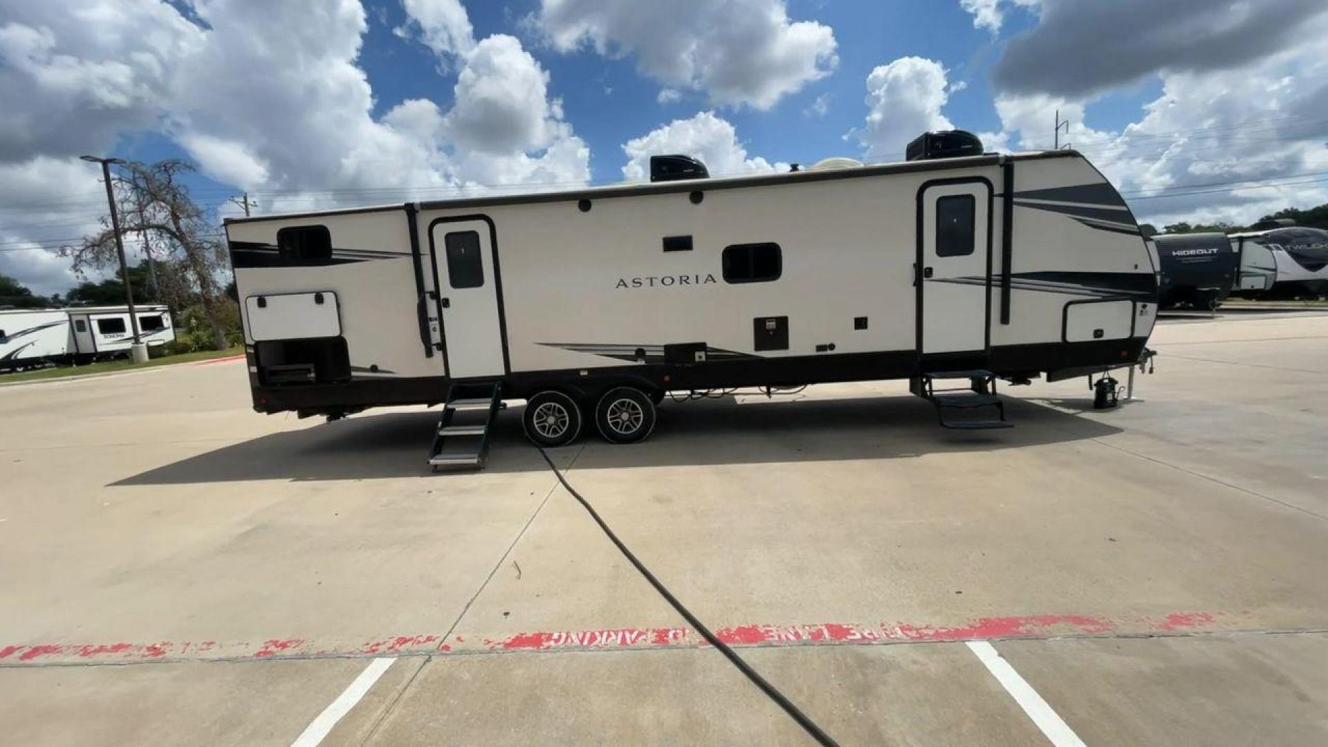 2021 DUTCHMEN ASTORIA 3202BH (4YDT32021MM) , Length: 36.83 ft. | Dry Weight: 7,724 lbs. | Slides: 2 transmission, located at 4319 N Main Street, Cleburne, TX, 76033, (817) 221-0660, 32.435829, -97.384178 - Photo#2