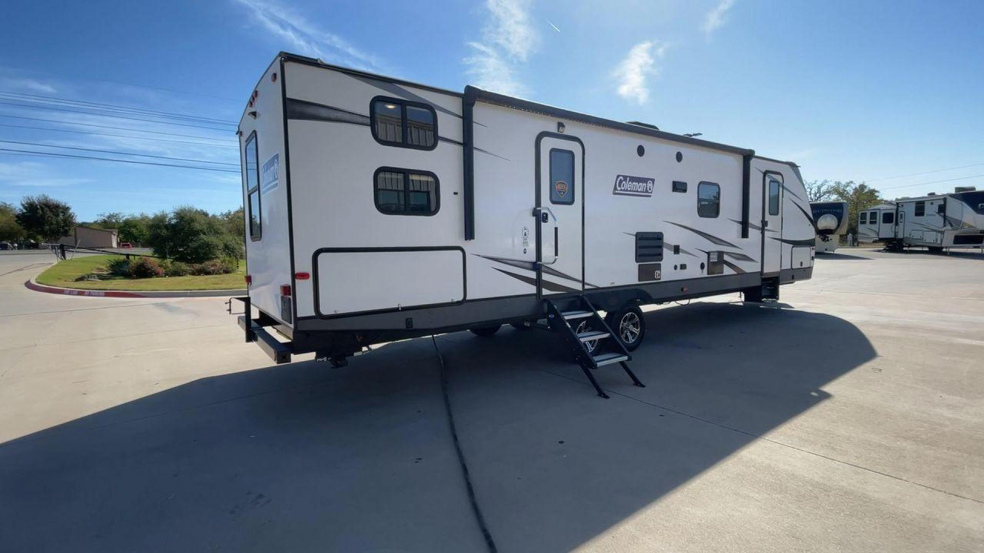 2021 DUTCHMEN COLEMAN 3215BH (4YDT32129MM) , Length: 36.92 ft. | Dry Weight: 7,718 lbs. | Slides: 2 transmission, located at 4319 N Main Street, Cleburne, TX, 76033, (817) 221-0660, 32.435829, -97.384178 - The 2021 Dutchmen Coleman 3215BH is a spacious and family-friendly travel trailer designed to provide comfort and convenience on the road. With its rear bunkhouse, large living space, and outdoor kitchen, this model is ideal for families who want a versatile RV with plenty of room for everyone. The - Photo#1