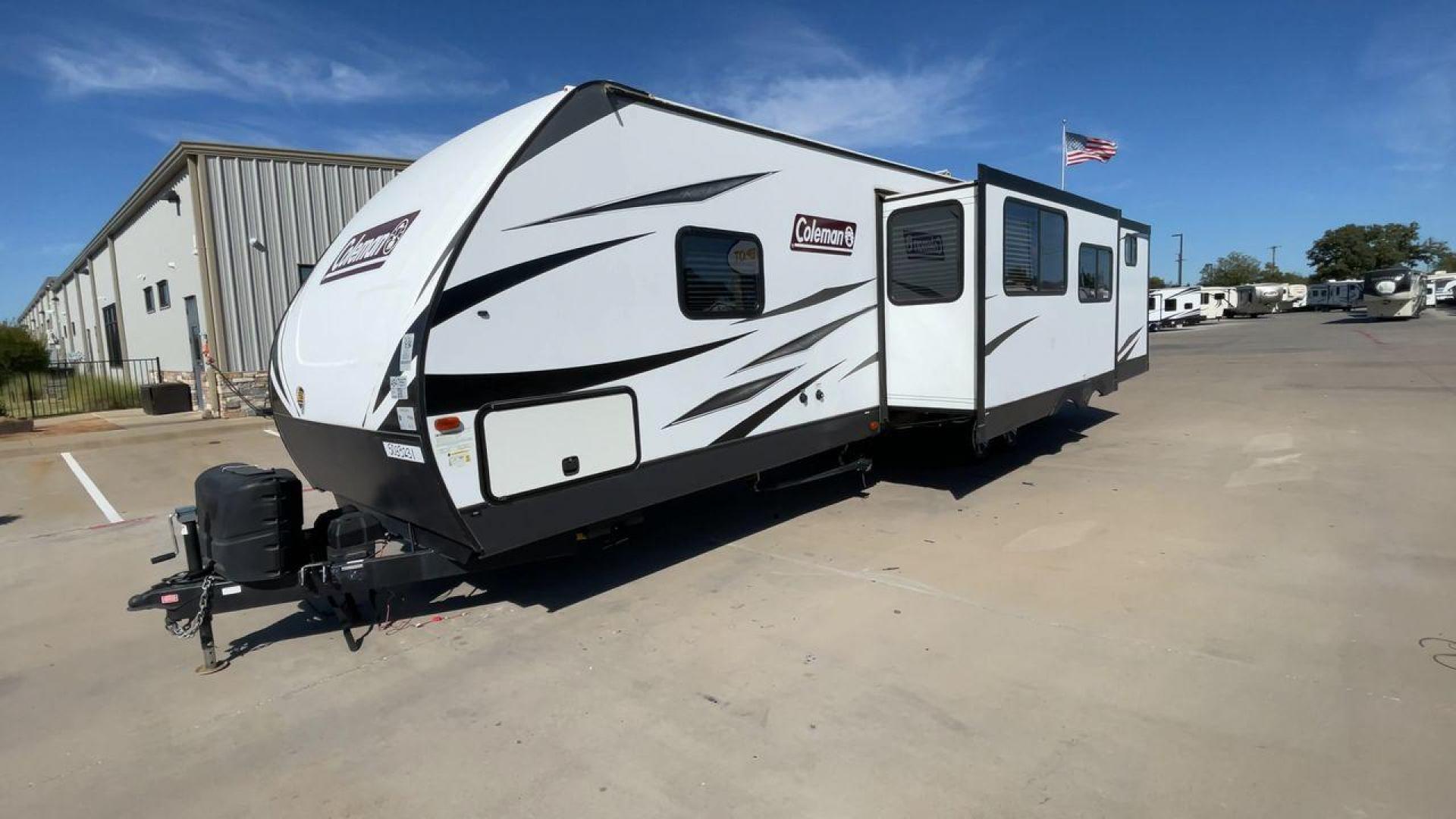 2021 DUTCHMEN COLEMAN 3215BH (4YDT32129MM) , Length: 36.92 ft. | Dry Weight: 7,718 lbs. | Slides: 2 transmission, located at 4319 N Main Street, Cleburne, TX, 76033, (817) 221-0660, 32.435829, -97.384178 - The 2021 Dutchmen Coleman 3215BH is a spacious and family-friendly travel trailer designed to provide comfort and convenience on the road. With its rear bunkhouse, large living space, and outdoor kitchen, this model is ideal for families who want a versatile RV with plenty of room for everyone. The - Photo#5