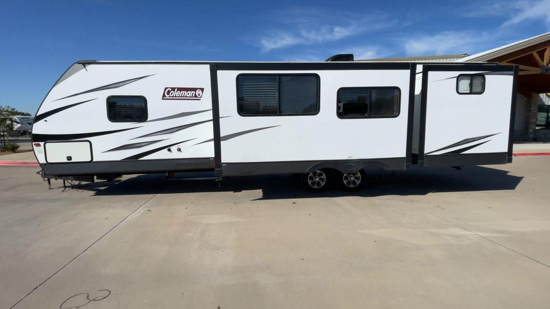 2021 DUTCHMEN COLEMAN 3215BH (4YDT32129MM) , Length: 36.92 ft. | Dry Weight: 7,718 lbs. | Slides: 2 transmission, located at 4319 N Main Street, Cleburne, TX, 76033, (817) 221-0660, 32.435829, -97.384178 - The 2021 Dutchmen Coleman 3215BH is a spacious and family-friendly travel trailer designed to provide comfort and convenience on the road. With its rear bunkhouse, large living space, and outdoor kitchen, this model is ideal for families who want a versatile RV with plenty of room for everyone. The - Photo#6