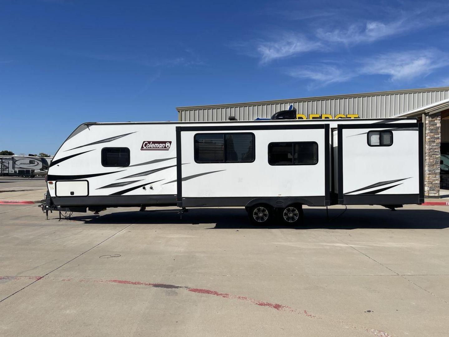 2021 DUTCHMEN COLEMAN 3215BH (4YDT32129MM) , Length: 36.92 ft. | Dry Weight: 7,718 lbs. | Slides: 2 transmission, located at 4319 N Main Street, Cleburne, TX, 76033, (817) 221-0660, 32.435829, -97.384178 - The 2021 Dutchmen Coleman 3215BH is a spacious and family-friendly travel trailer designed to provide comfort and convenience on the road. With its rear bunkhouse, large living space, and outdoor kitchen, this model is ideal for families who want a versatile RV with plenty of room for everyone. The - Photo#24