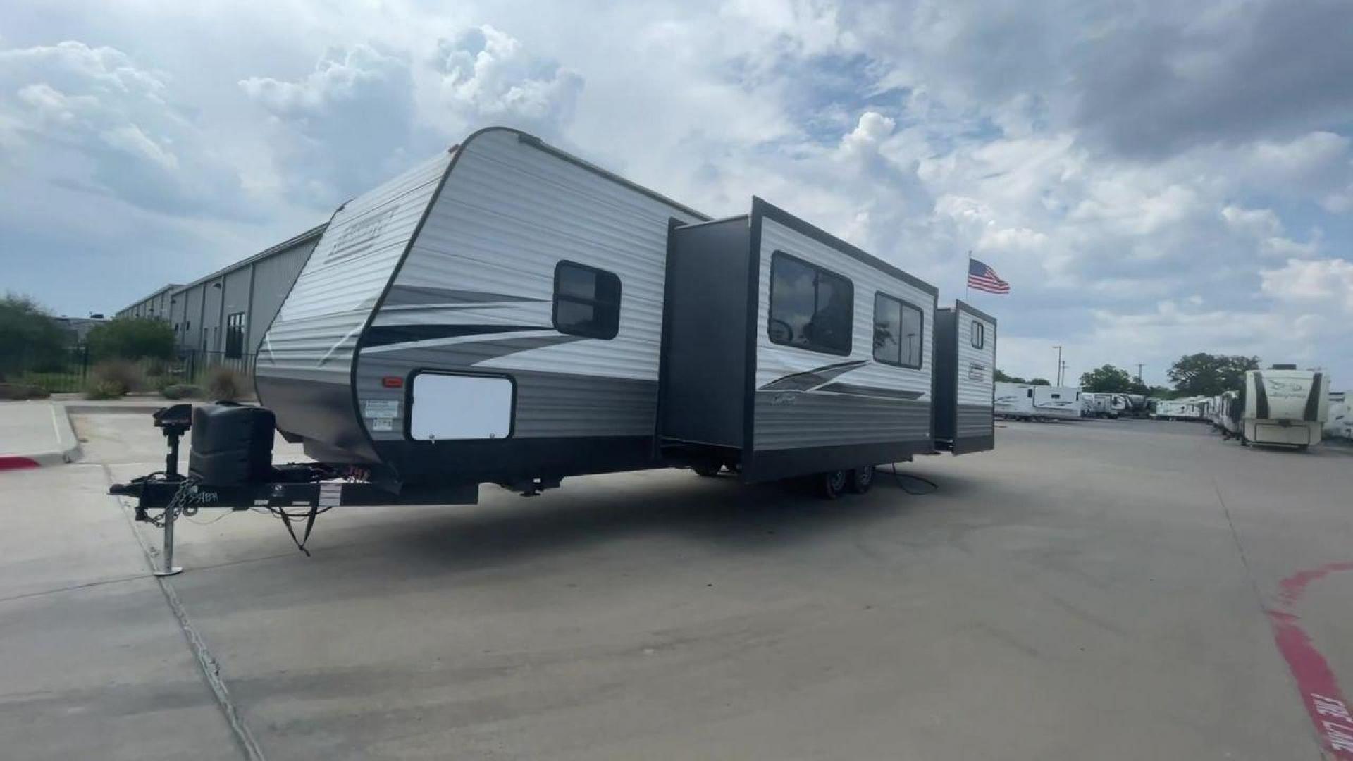 2021 WHITE DUTCHMEN COLEMAN 334BH (4YDT3342XMH) , Length: 37.25 ft. | Dry Weight: 7,806 lbs. | Slides: 2 transmission, located at 4319 N Main Street, Cleburne, TX, 76033, (817) 221-0660, 32.435829, -97.384178 - The 2021 Dutchmen Coleman 334BH is a luxurious and spacious travel trailer designed to redefine your camping experience. Its exterior boasts a length of 37 feet, a width of 8 feet, and a dry weight of 7,806 lbs. The aluminum frame construction ensures durability and lightweight towing, while the hig - Photo#5