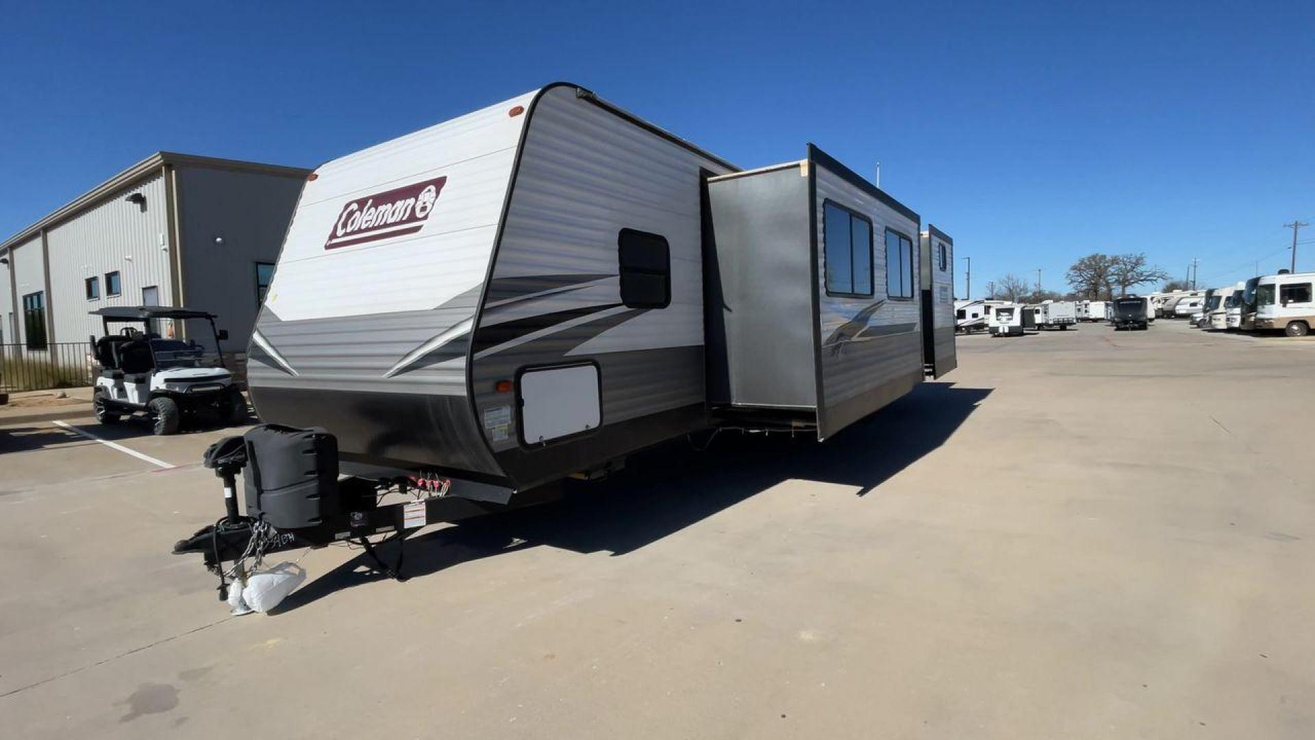 2021 WHITE DUTCHMEN COLEMAN 334BH (4YDT3342XMH) , Length: 37.25 ft. | Dry Weight: 7,806 lbs. | Slides: 2 transmission, located at 4319 N Main Street, Cleburne, TX, 76033, (817) 221-0660, 32.435829, -97.384178 - The 2021 Dutchmen Coleman 334BH is a luxurious and spacious travel trailer designed to redefine your camping experience. Its exterior boasts a length of 37 feet, a width of 8 feet, and a dry weight of 7,806 lbs. The aluminum frame construction ensures durability and lightweight towing, while the hig - Photo#5