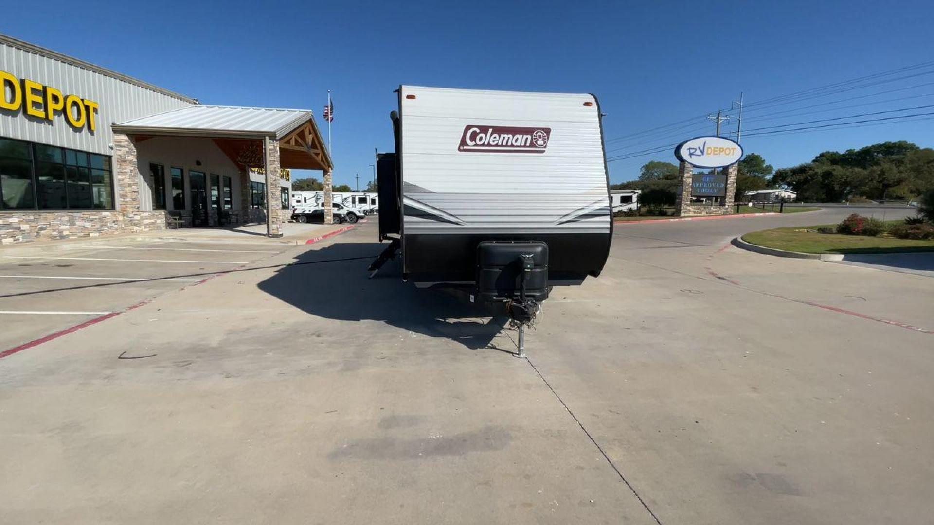 2021 DUTCHMEN COLEMAN 337BH (4YDT33723MH) , Length: 37.92 ft. | Dry Weight: 8,481 lbs. | Slides: 3 transmission, located at 4319 N Main Street, Cleburne, TX, 76033, (817) 221-0660, 32.435829, -97.384178 - The 2021 Dutchmen Coleman 337BH, stretching 37.92 feet in length and weighing 8,481 lbs, showcases a sleek exterior designed for functionality and style. With its gray and black color scheme accented by the Coleman branding, this RV has a sturdy, aerodynamic front and a solid frame for durability. T - Photo#4