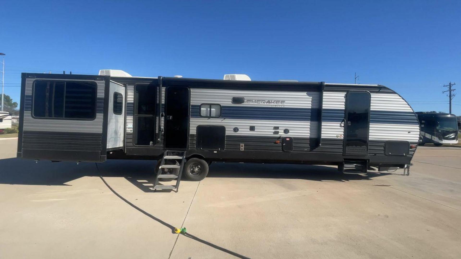 2021 FOREST RIVER CHEROKEE 306MM (4X4TCKG29MX) , Length: 39.92 ft. | Dry Weight: 8,578 lbs. | Gross Weight: 11,100 lbs. | Slides: 3 transmission, located at 4319 N Main Street, Cleburne, TX, 76033, (817) 221-0660, 32.435829, -97.384178 - Photo#2