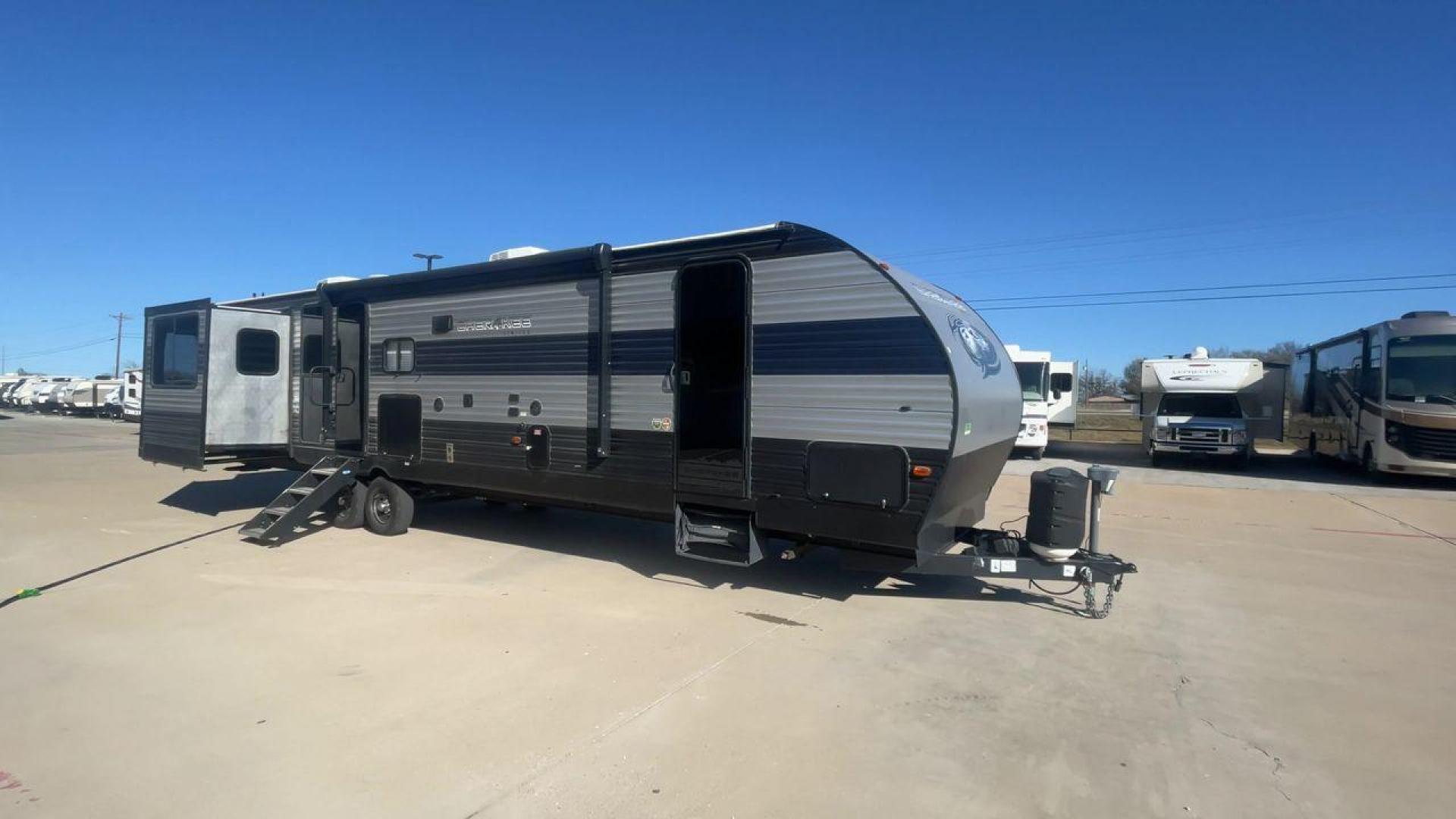 2021 FOREST RIVER CHEROKEE 306MM (4X4TCKG29MX) , Length: 39.92 ft. | Dry Weight: 8,578 lbs. | Gross Weight: 11,100 lbs. | Slides: 3 transmission, located at 4319 N Main Street, Cleburne, TX, 76033, (817) 221-0660, 32.435829, -97.384178 - Photo#3