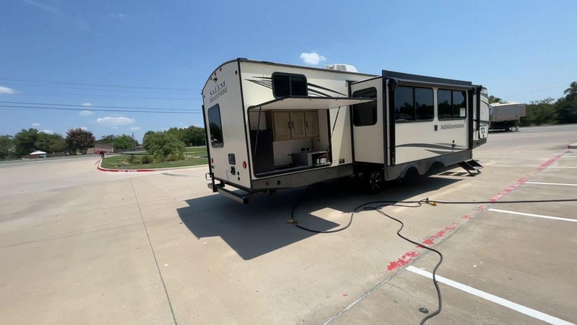 2021 FOREST RIVER HEMISPHERE 310BHS (4X4TSBG21MU) , Length: 38.67 ft. | Dry Weight: 9,088 lbs. | Slides: 3 transmission, located at 4319 N Main Street, Cleburne, TX, 76033, (817) 221-0660, 32.435829, -97.384178 - Photo#1