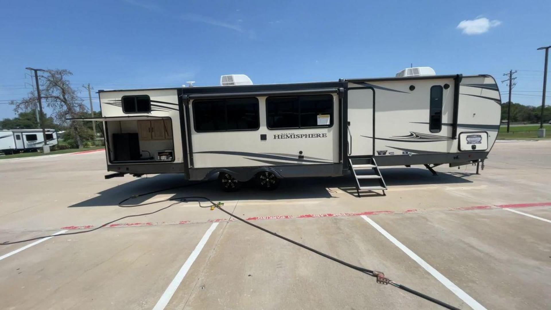 2021 FOREST RIVER HEMISPHERE 310BHS (4X4TSBG21MU) , Length: 38.67 ft. | Dry Weight: 9,088 lbs. | Slides: 3 transmission, located at 4319 N Main Street, Cleburne, TX, 76033, (817) 221-0660, 32.435829, -97.384178 - Photo#2