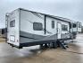 2021 FOREST RIVER IMPRESSION 320FL (5ZT3MPXB1MD) , Length: 40.17 ft | Dry Weight: 10,303 lbs | Gross Weight: 14,535 lbs | Slides: 4 transmission, located at 4319 N Main Street, Cleburne, TX, 76033, (817) 221-0660, 32.435829, -97.384178 - The 2021 Forest River Impression 320FL fifth wheel RV is built for durability and style. Its sleek white fiberglass body is accented with bold black and blue graphics, giving it a modern and aerodynamic look. The front cap features a distinctive aerodynamic profile with the Impression logo prominent - Photo#25