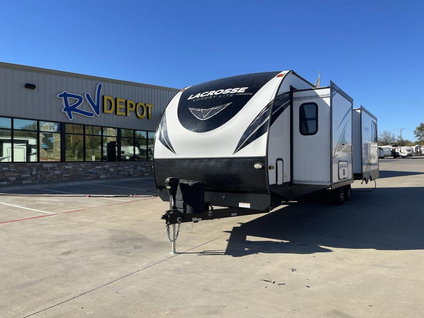 2021 FOREST RIVER LACROSSE 3399SE (5ZT2LCZB5MB) , Length: 37.58 ft. | Dry Weight: 8,678 lbs. | Slides: 3 transmission, located at 4319 N Main Street, Cleburne, TX, 76033, (817) 221-0660, 32.435829, -97.384178 - The 2021 Forest River LaCrosse 3399SE is a stunning travel trailer that seamlessly combines elegance with functionality. With a length of 37.58 feet, a dry weight of 8,678 lbs, and three slides, this model offers a spacious and well-balanced interior for a luxurious camping experience. The large kit - Photo#0