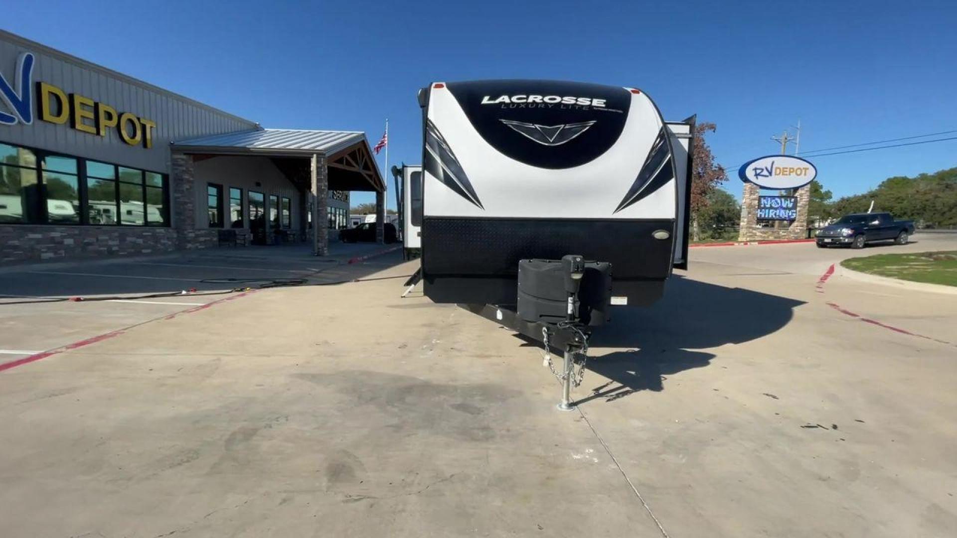 2021 FOREST RIVER LACROSSE 3399SE (5ZT2LCZB5MB) , Length: 37.58 ft. | Dry Weight: 8,678 lbs. | Slides: 3 transmission, located at 4319 N Main Street, Cleburne, TX, 76033, (817) 221-0660, 32.435829, -97.384178 - The 2021 Forest River LaCrosse 3399SE is a stunning travel trailer that seamlessly combines elegance with functionality. With a length of 37.58 feet, a dry weight of 8,678 lbs, and three slides, this model offers a spacious and well-balanced interior for a luxurious camping experience. The large kit - Photo#4