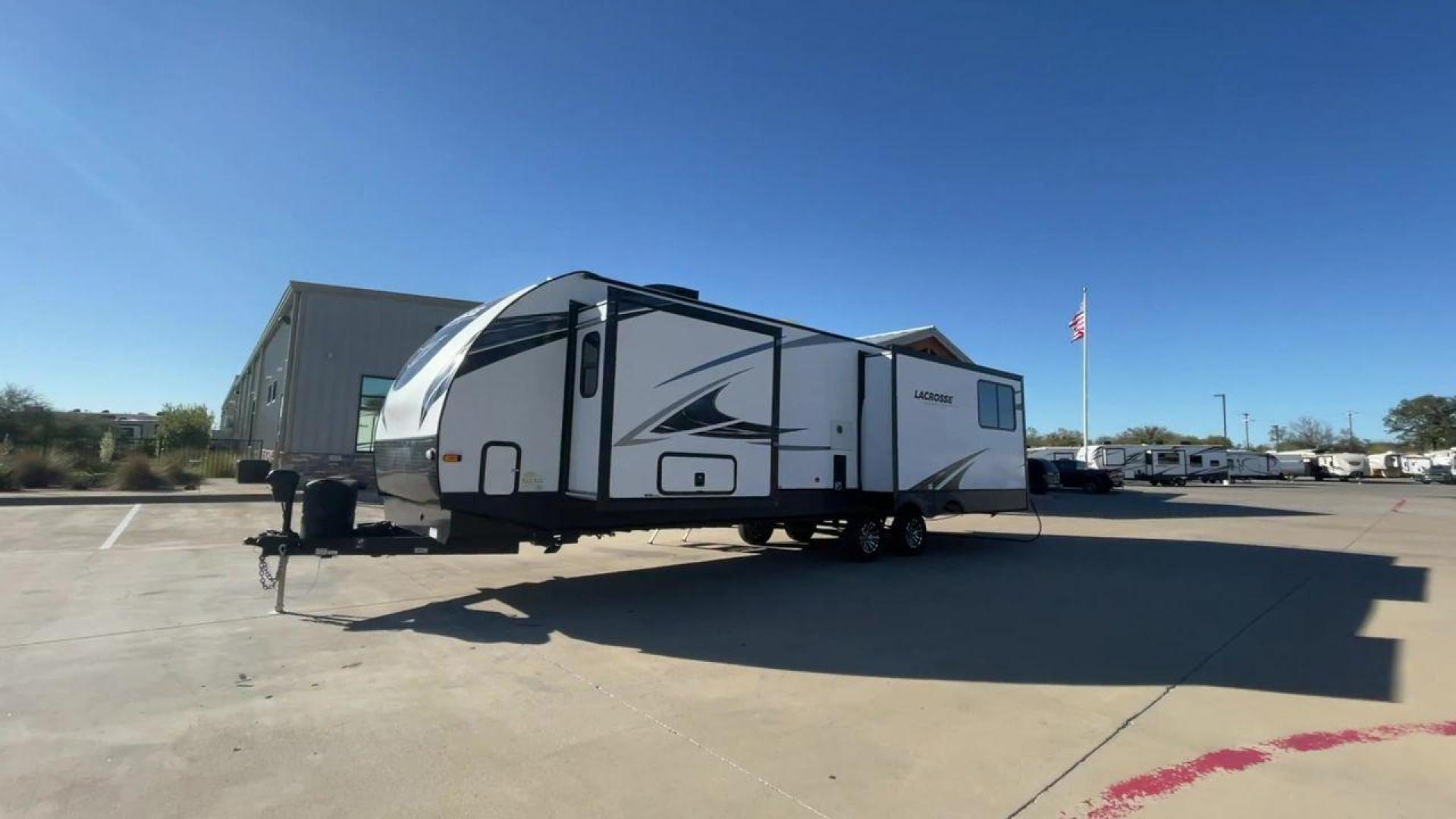 2021 FOREST RIVER LACROSSE 3399SE (5ZT2LCZB5MB) , Length: 37.58 ft. | Dry Weight: 8,678 lbs. | Slides: 3 transmission, located at 4319 N Main Street, Cleburne, TX, 76033, (817) 221-0660, 32.435829, -97.384178 - The 2021 Forest River LaCrosse 3399SE is a stunning travel trailer that seamlessly combines elegance with functionality. With a length of 37.58 feet, a dry weight of 8,678 lbs, and three slides, this model offers a spacious and well-balanced interior for a luxurious camping experience. The large kit - Photo#5