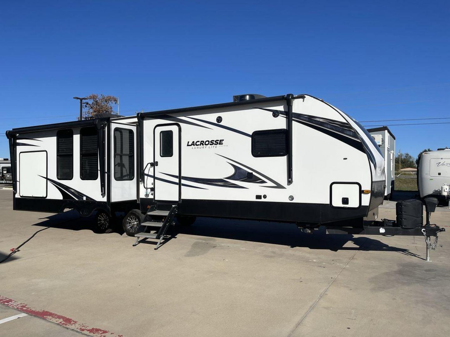 2021 FOREST RIVER LACROSSE 3399SE (5ZT2LCZB5MB) , Length: 37.58 ft. | Dry Weight: 8,678 lbs. | Slides: 3 transmission, located at 4319 N Main Street, Cleburne, TX, 76033, (817) 221-0660, 32.435829, -97.384178 - The 2021 Forest River LaCrosse 3399SE is a stunning travel trailer that seamlessly combines elegance with functionality. With a length of 37.58 feet, a dry weight of 8,678 lbs, and three slides, this model offers a spacious and well-balanced interior for a luxurious camping experience. The large kit - Photo#23