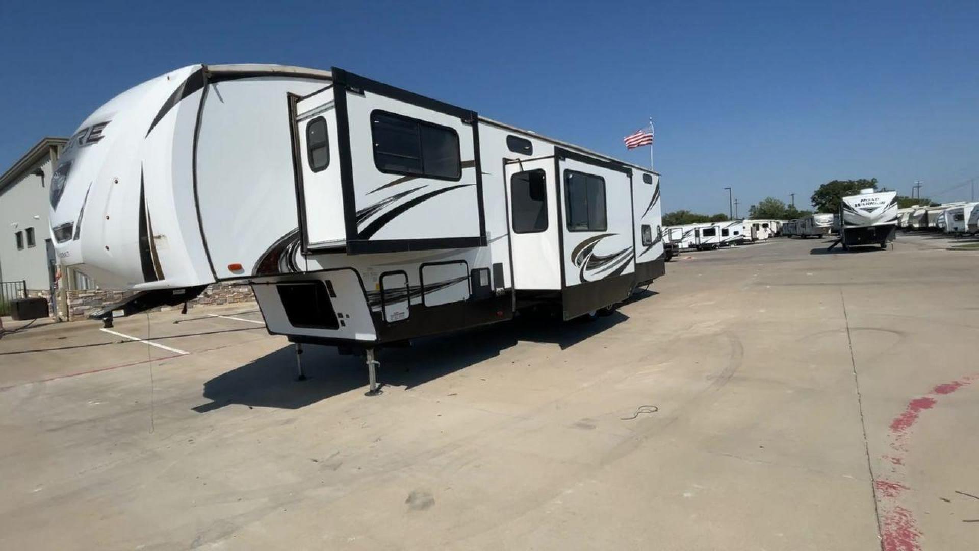 2021 FOREST RIVER SABRE 37FLL (5ZT3SR2B3M6) , Length: 42.75 ft. | Dry Weight: 11,918 lbs. | Slides: 4 transmission, located at 4319 N Main Street, Cleburne, TX, 76033, (817) 221-0660, 32.435829, -97.384178 - The 2021 Forest River Sabre 37FLL is a large, luxurious fifth-wheel trailer that measures 42.75 feet in length and features four slide-outs. It has an aerodynamic front cap with the Sabre Cobalt logo and bold, modern graphics. The curved front end is designed to reduce wind drag when towing. The rea - Photo#5