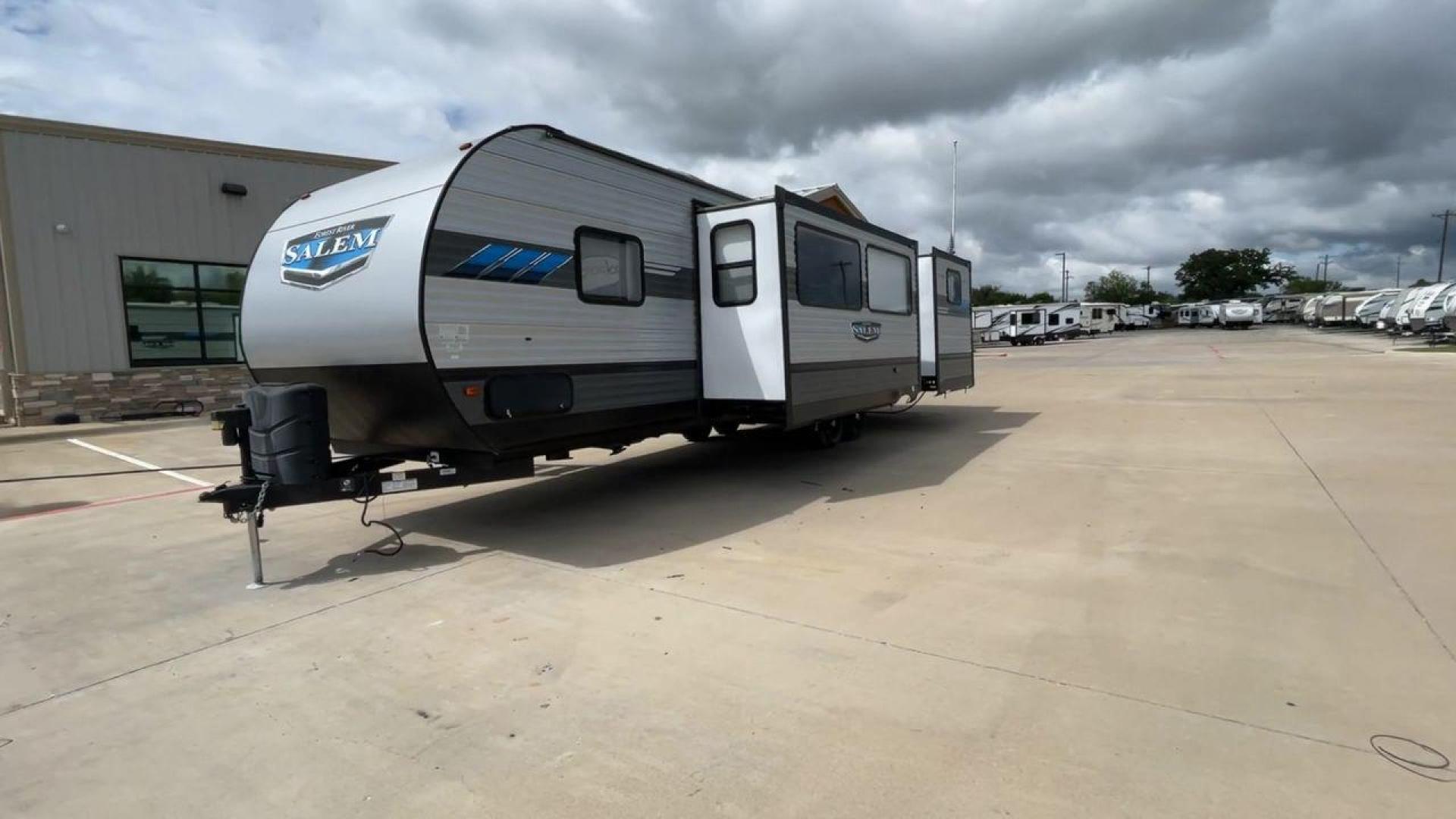 2021 FOREST RIVER SALEM 31KQBTS (4X4TSMG26M8) , Length: 36.5 ft. | Dry Weight: 8,573 lbs. | Slides: 3 transmission, located at 4319 N Main Street, Cleburne, TX, 76033, (817) 221-0660, 32.435829, -97.384178 - The 2021 Forest River Salem 31KQBTS is a versatile, spacious, and well-designed travel trailer perfect for families and groups. This unit has a sleek, modern exterior with rugged aluminum siding and three large slide-outs for added space. The retractable outdoor kitchen adds convenience for outdoor - Photo#5