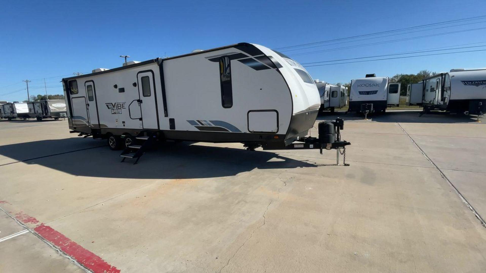 2021 FOREST RIVER VIBE 32BH (4X4TVBH21M4) , Length: 38.25 ft. | Dry Weight: 7,836 lbs. | Slides: 2 transmission, located at 4319 N Main Street, Cleburne, TX, 76033, (817) 221-0660, 32.435829, -97.384178 - Photo#3