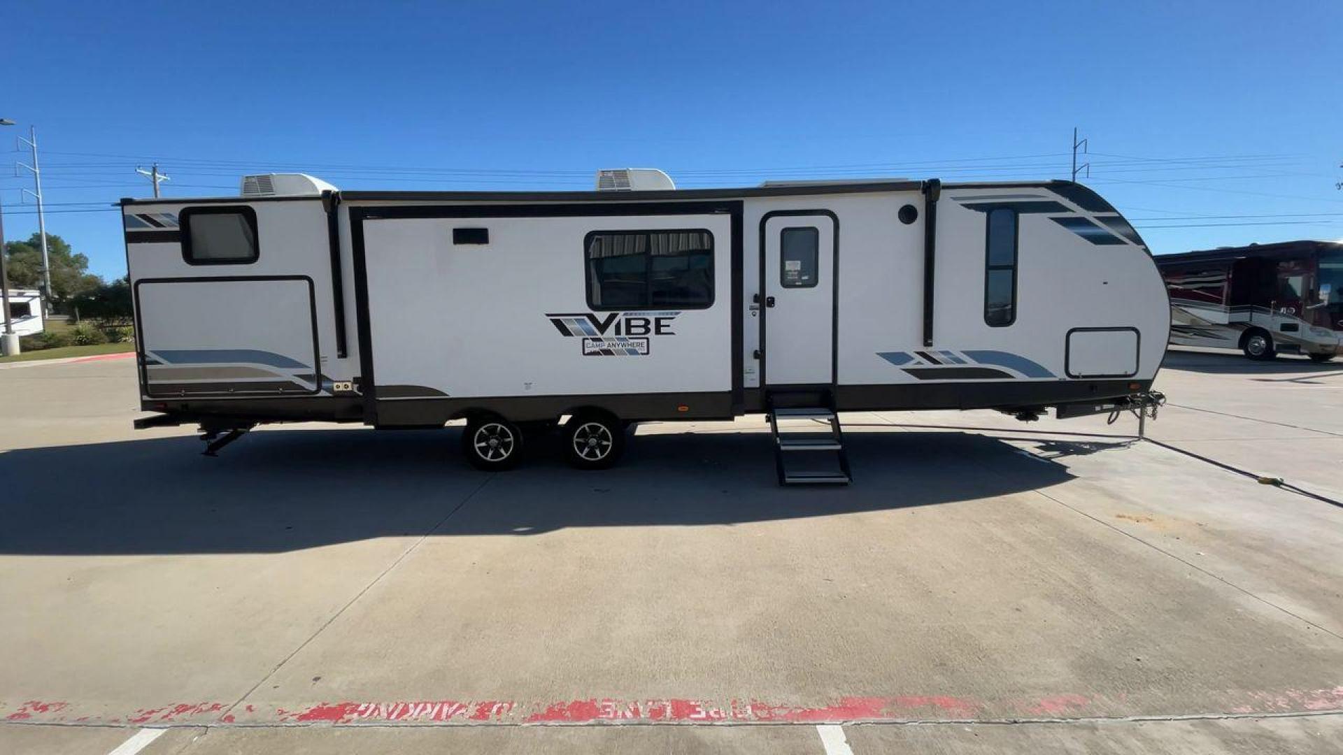 2021 FOREST RIVER VIBE 34BH (4X4TVBK20M4) , Length: 39.42 ft. | Dry Weight: 8,164 lbs. | Slides: 3 transmission, located at 4319 N Main Street, Cleburne, TX, 76033, (817) 221-0660, 32.435829, -97.384178 - Photo#2