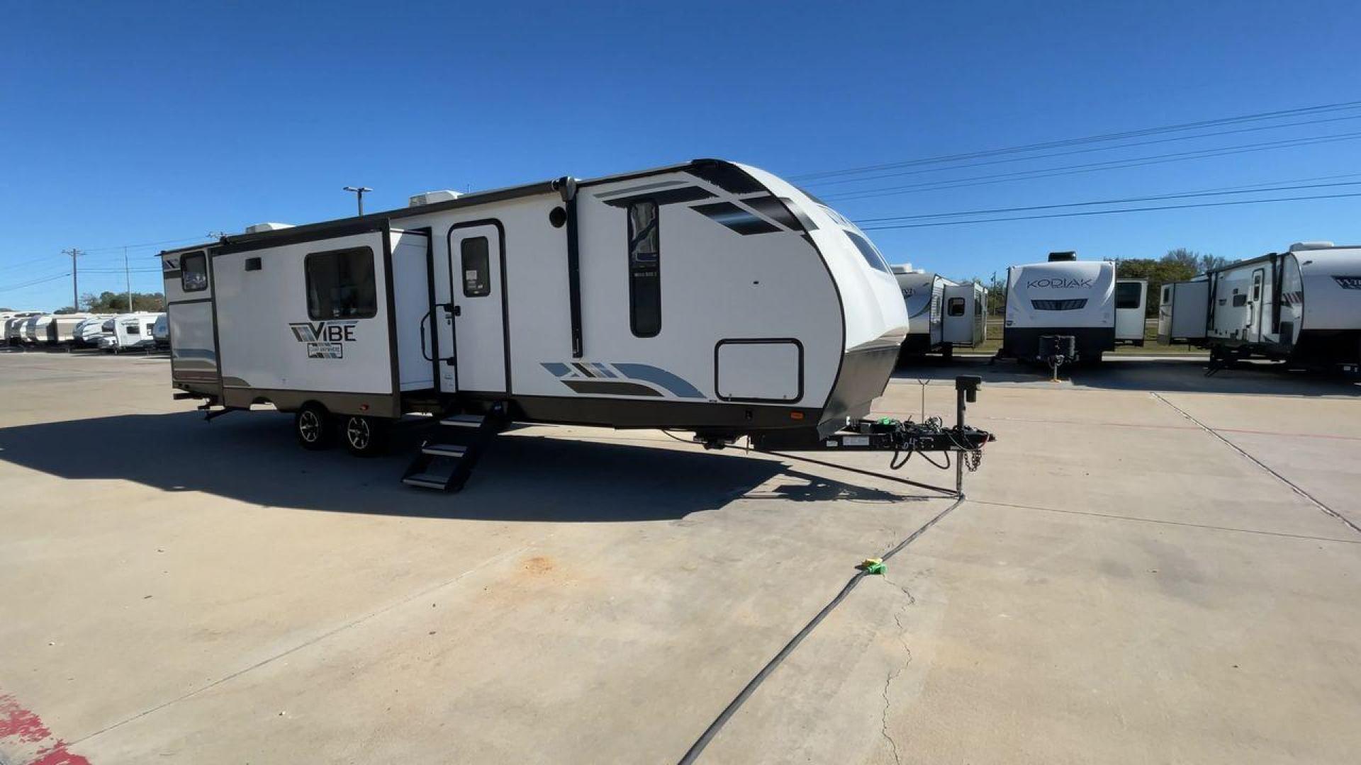 2021 FOREST RIVER VIBE 34BH (4X4TVBK20M4) , Length: 39.42 ft. | Dry Weight: 8,164 lbs. | Slides: 3 transmission, located at 4319 N Main Street, Cleburne, TX, 76033, (817) 221-0660, 32.435829, -97.384178 - Photo#3