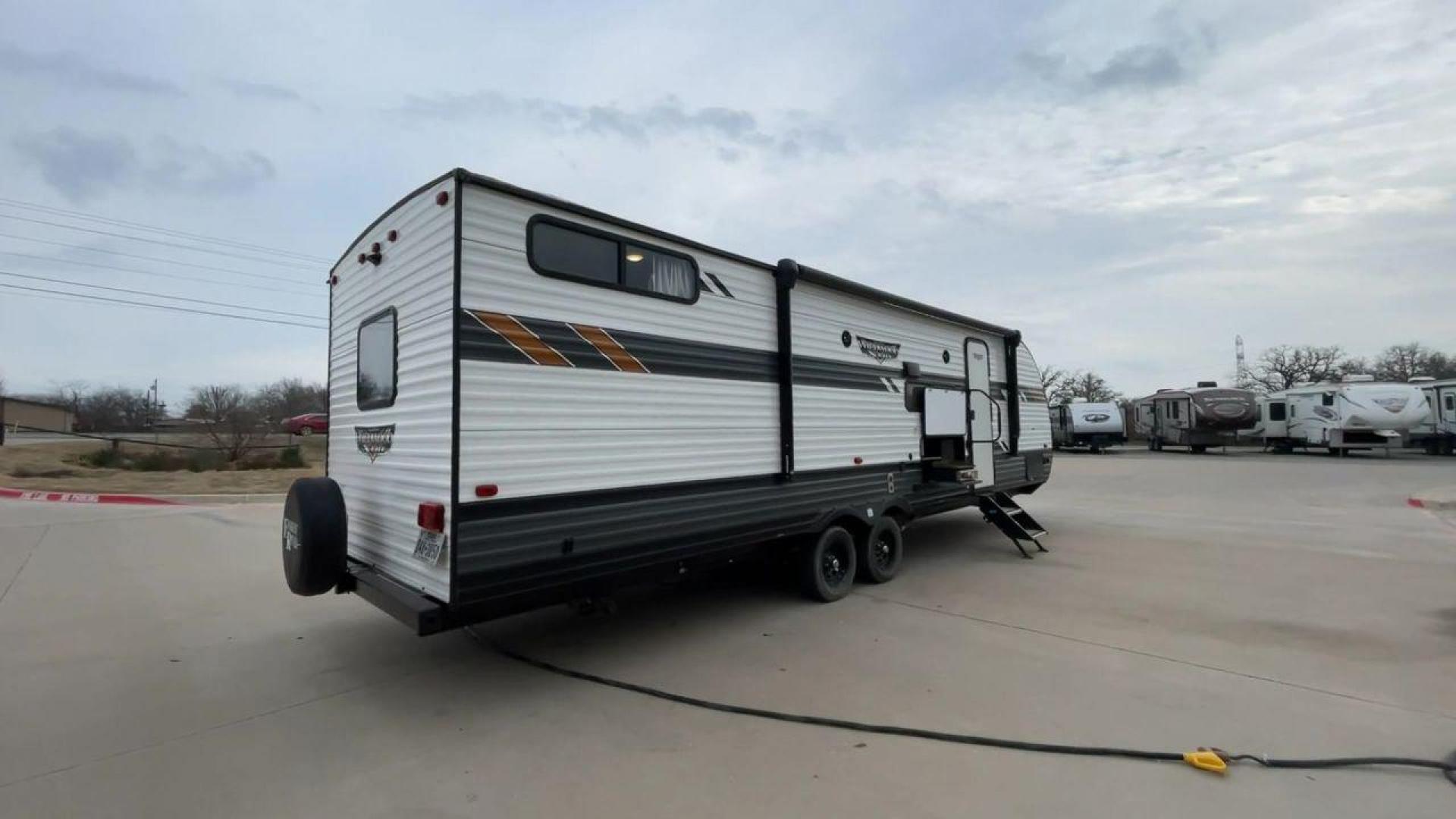 2021 FOREST RIVER WILDWOOD 28VBXL (4X4TWDD25M7) , Length: 33.33 ft. | Dry Weight: 6,486 lbs. | Slides: 1 transmission, located at 4319 N Main Street, Cleburne, TX, 76033, (817) 221-0660, 32.435829, -97.384178 - Explore the ideal mix of comfort and family-friendly excitement with the 2021 Forest River Wildwood 28VBXL. This 33-foot travel trailer offers a spacious and versatile interior perfect for families and friends looking to create lasting camping memories. This Wildwood 28VBXL model showcases a distinc - Photo#1