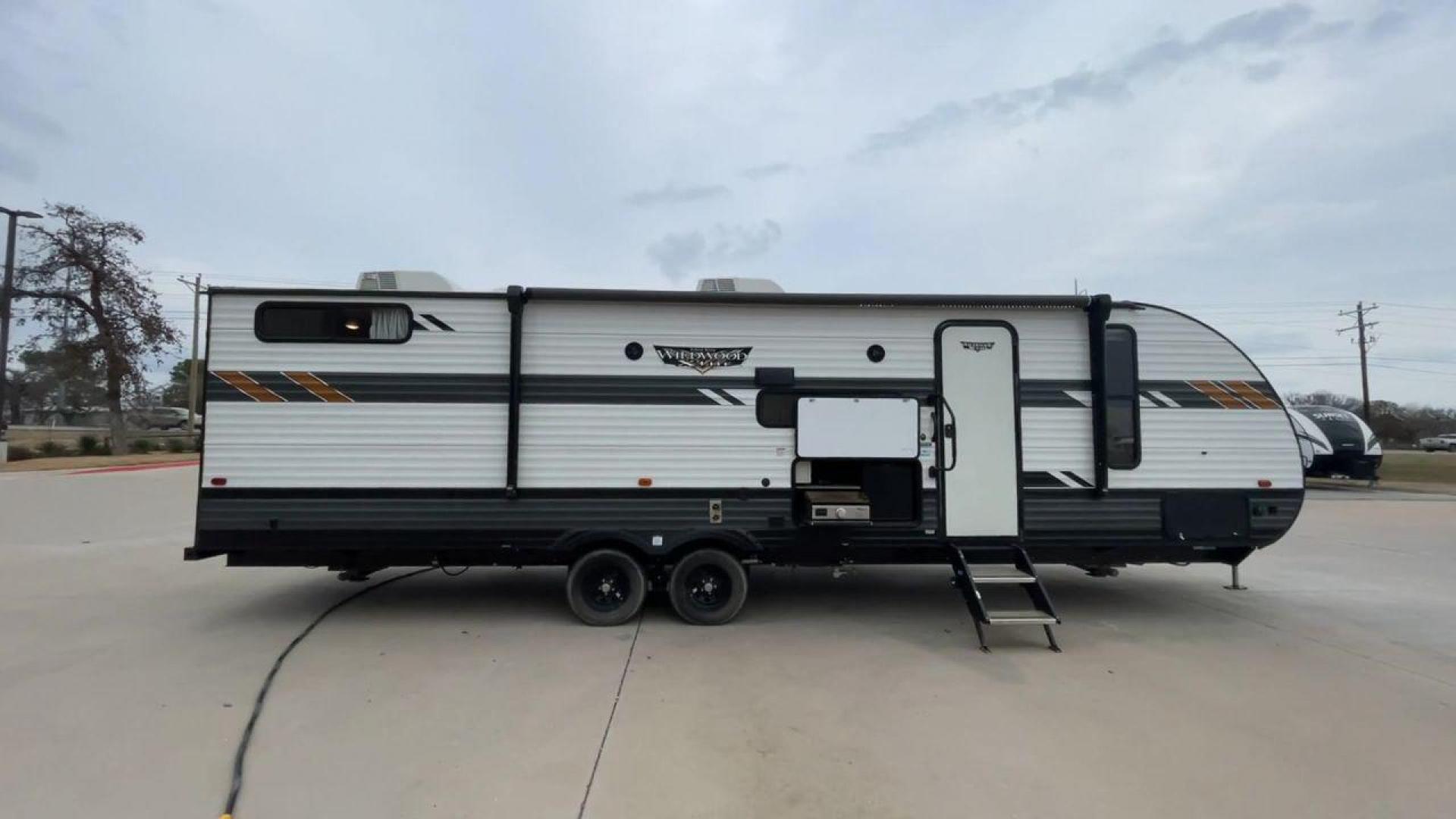 2021 FOREST RIVER WILDWOOD 28VBXL (4X4TWDD25M7) , Length: 33.33 ft. | Dry Weight: 6,486 lbs. | Slides: 1 transmission, located at 4319 N Main Street, Cleburne, TX, 76033, (817) 221-0660, 32.435829, -97.384178 - Explore the ideal mix of comfort and family-friendly excitement with the 2021 Forest River Wildwood 28VBXL. This 33-foot travel trailer offers a spacious and versatile interior perfect for families and friends looking to create lasting camping memories. This Wildwood 28VBXL model showcases a distinc - Photo#2