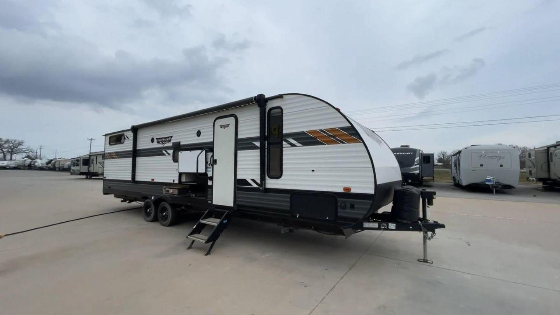 2021 FOREST RIVER WILDWOOD 28VBXL (4X4TWDD25M7) , Length: 33.33 ft. | Dry Weight: 6,486 lbs. | Slides: 1 transmission, located at 4319 N Main Street, Cleburne, TX, 76033, (817) 221-0660, 32.435829, -97.384178 - Explore the ideal mix of comfort and family-friendly excitement with the 2021 Forest River Wildwood 28VBXL. This 33-foot travel trailer offers a spacious and versatile interior perfect for families and friends looking to create lasting camping memories. This Wildwood 28VBXL model showcases a distinc - Photo#3