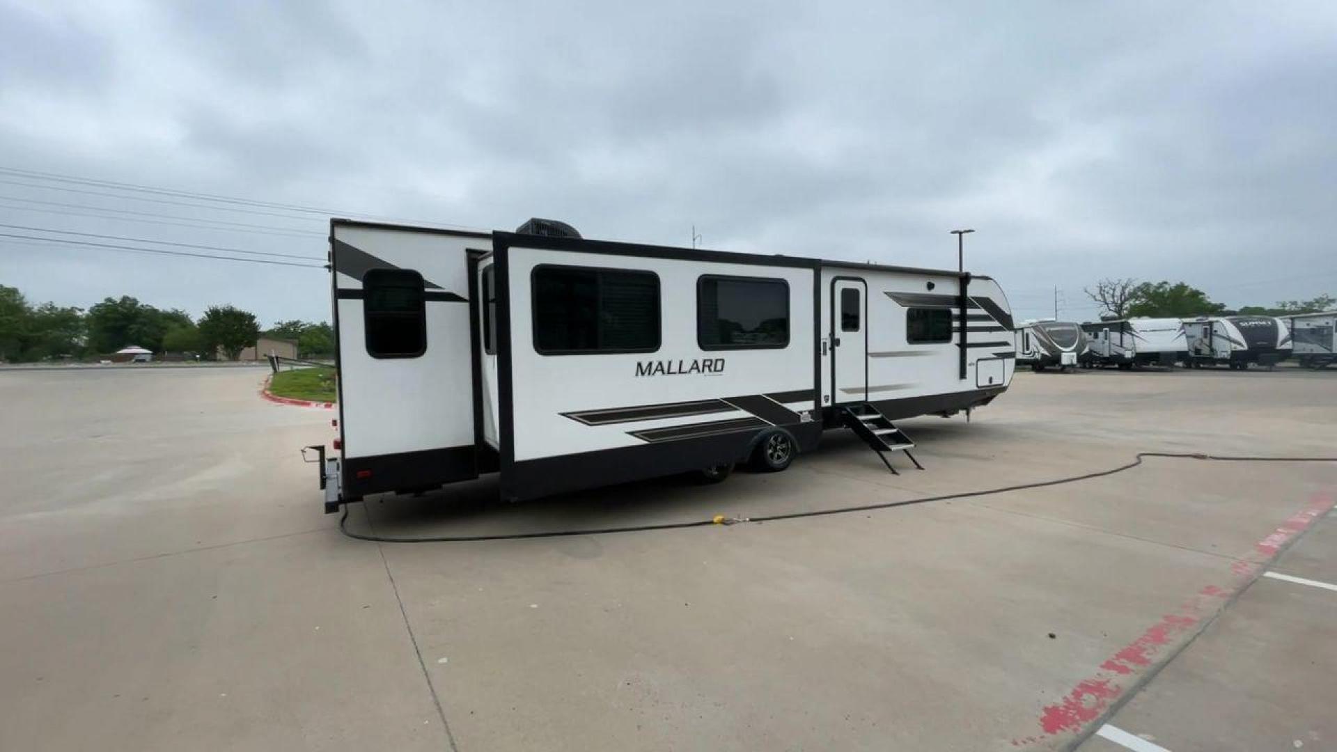 2021 HEARTLAND MALLARD M335 (5SFNB4027ME) , located at 4319 N Main Street, Cleburne, TX, 76033, (817) 221-0660, 32.435829, -97.384178 - Photo#1