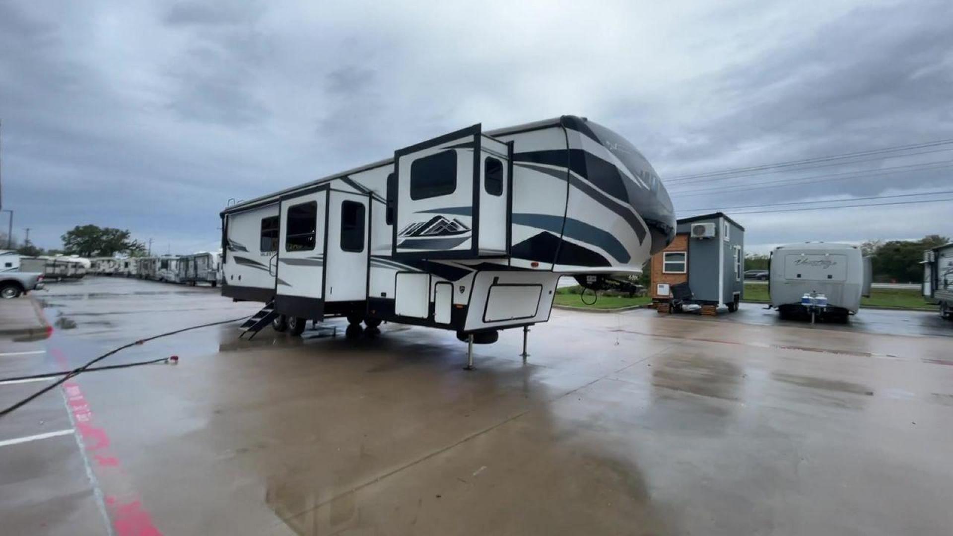 2021 HEARTLAND MILESTONE 370FLMB (5SFMG4521ME) , Length: 44.58 ft. | Dry Weight: 12,520 lbs. | GVWR: 15,500 lbs. | Slides: 5 transmission, located at 4319 N Main Street, Cleburne, TX, 76033, (817) 221-0660, 32.435829, -97.384178 - Experience the ideal fusion of adventure and comfort with the Heartland Milestone 370FLMB fifth wheel from 2021. This roomy and well-equipped RV is made to give you all the conveniences and comforts you require for enjoyable outdoor travels. The dimensions for this unit are 44.58 ft in length, 8 - Photo#3