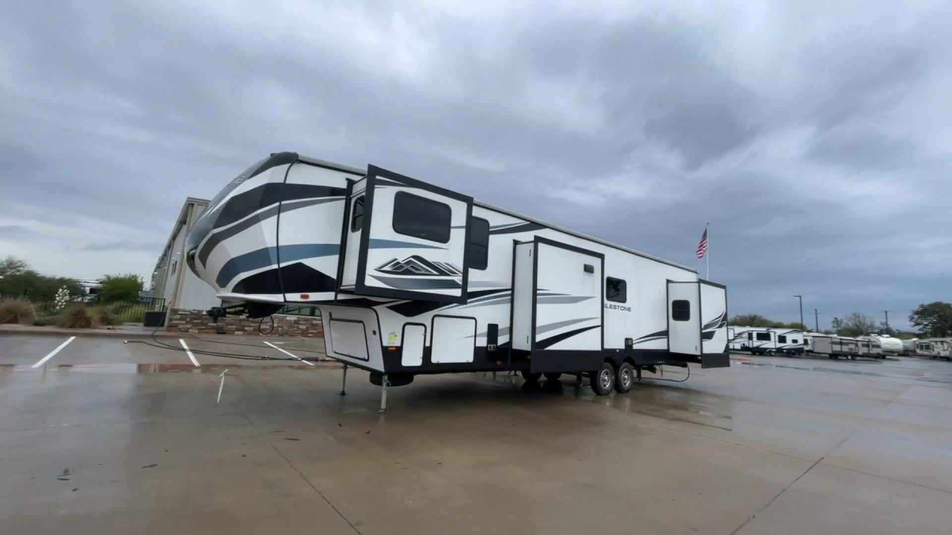 2021 HEARTLAND MILESTONE 370FLMB (5SFMG4521ME) , Length: 44.58 ft. | Dry Weight: 12,520 lbs. | GVWR: 15,500 lbs. | Slides: 5 transmission, located at 4319 N Main Street, Cleburne, TX, 76033, (817) 221-0660, 32.435829, -97.384178 - Experience the ideal fusion of adventure and comfort with the Heartland Milestone 370FLMB fifth wheel from 2021. This roomy and well-equipped RV is made to give you all the conveniences and comforts you require for enjoyable outdoor travels. The dimensions for this unit are 44.58 ft in length, 8 - Photo#5