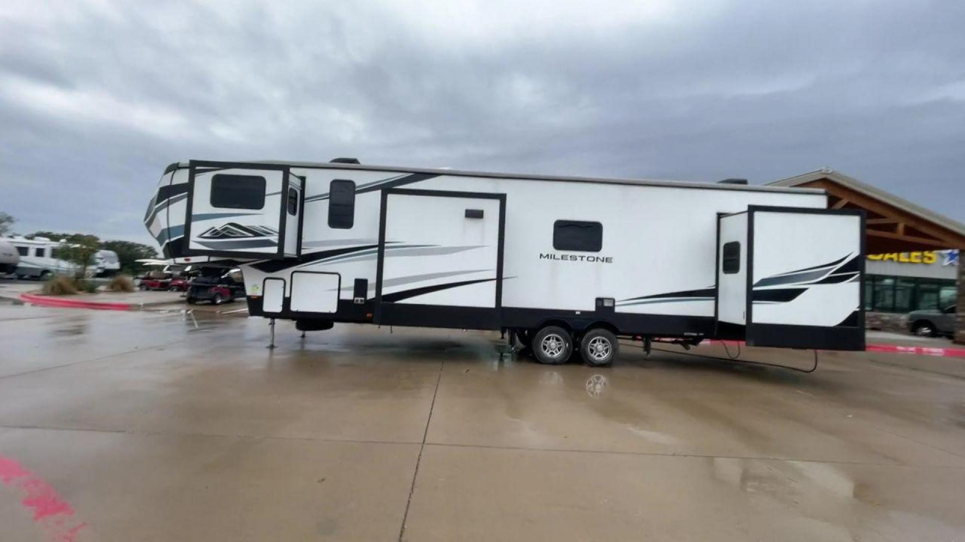 2021 HEARTLAND MILESTONE 370FLMB (5SFMG4521ME) , Length: 44.58 ft. | Dry Weight: 12,520 lbs. | GVWR: 15,500 lbs. | Slides: 5 transmission, located at 4319 N Main Street, Cleburne, TX, 76033, (817) 221-0660, 32.435829, -97.384178 - Experience the ideal fusion of adventure and comfort with the Heartland Milestone 370FLMB fifth wheel from 2021. This roomy and well-equipped RV is made to give you all the conveniences and comforts you require for enjoyable outdoor travels. The dimensions for this unit are 44.58 ft in length, 8 - Photo#6