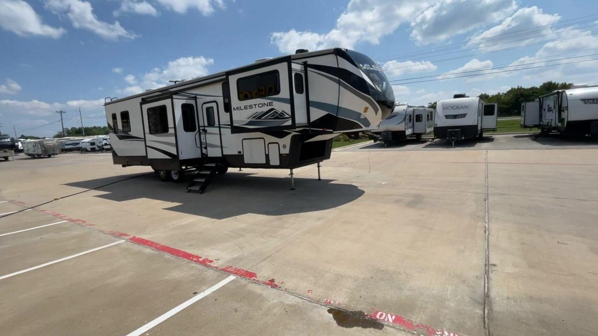 2021 HEARTLAND MILESTONE 379FLML (5SFMG4426ME) , Length: 44.17 ft. | Dry Weight: 12,600 lbs. | Gross Weight: 15,000 lbs. | Slides: 5 transmission, located at 4319 N Main Street, Cleburne, TX, 76033, (817) 221-0660, 32.435829, -97.384178 - The 2021 Heartland Milestone 379FLML is 44.17 feet in length and has a dry weight of 12,600 pounds, with a gross weight capability of 15,000 pounds. This type of RV is intended for extended living and luxurious travel. It comes with five slide-outs that dramatically increase interior space, creating - Photo#3