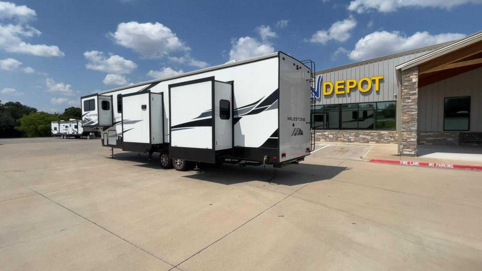 2021 HEARTLAND MILESTONE 379FLML (5SFMG4426ME) , Length: 44.17 ft. | Dry Weight: 12,600 lbs. | Gross Weight: 15,000 lbs. | Slides: 5 transmission, located at 4319 N Main Street, Cleburne, TX, 76033, (817) 221-0660, 32.435829, -97.384178 - The 2021 Heartland Milestone 379FLML is 44.17 feet in length and has a dry weight of 12,600 pounds, with a gross weight capability of 15,000 pounds. This type of RV is intended for extended living and luxurious travel. It comes with five slide-outs that dramatically increase interior space, creating - Photo#7