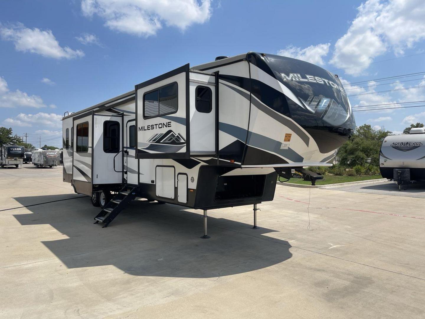 2021 HEARTLAND MILESTONE 379FLML (5SFMG4426ME) , Length: 44.17 ft. | Dry Weight: 12,600 lbs. | Gross Weight: 15,000 lbs. | Slides: 5 transmission, located at 4319 N Main Street, Cleburne, TX, 76033, (817) 221-0660, 32.435829, -97.384178 - The 2021 Heartland Milestone 379FLML is 44.17 feet in length and has a dry weight of 12,600 pounds, with a gross weight capability of 15,000 pounds. This type of RV is intended for extended living and luxurious travel. It comes with five slide-outs that dramatically increase interior space, creating - Photo#23